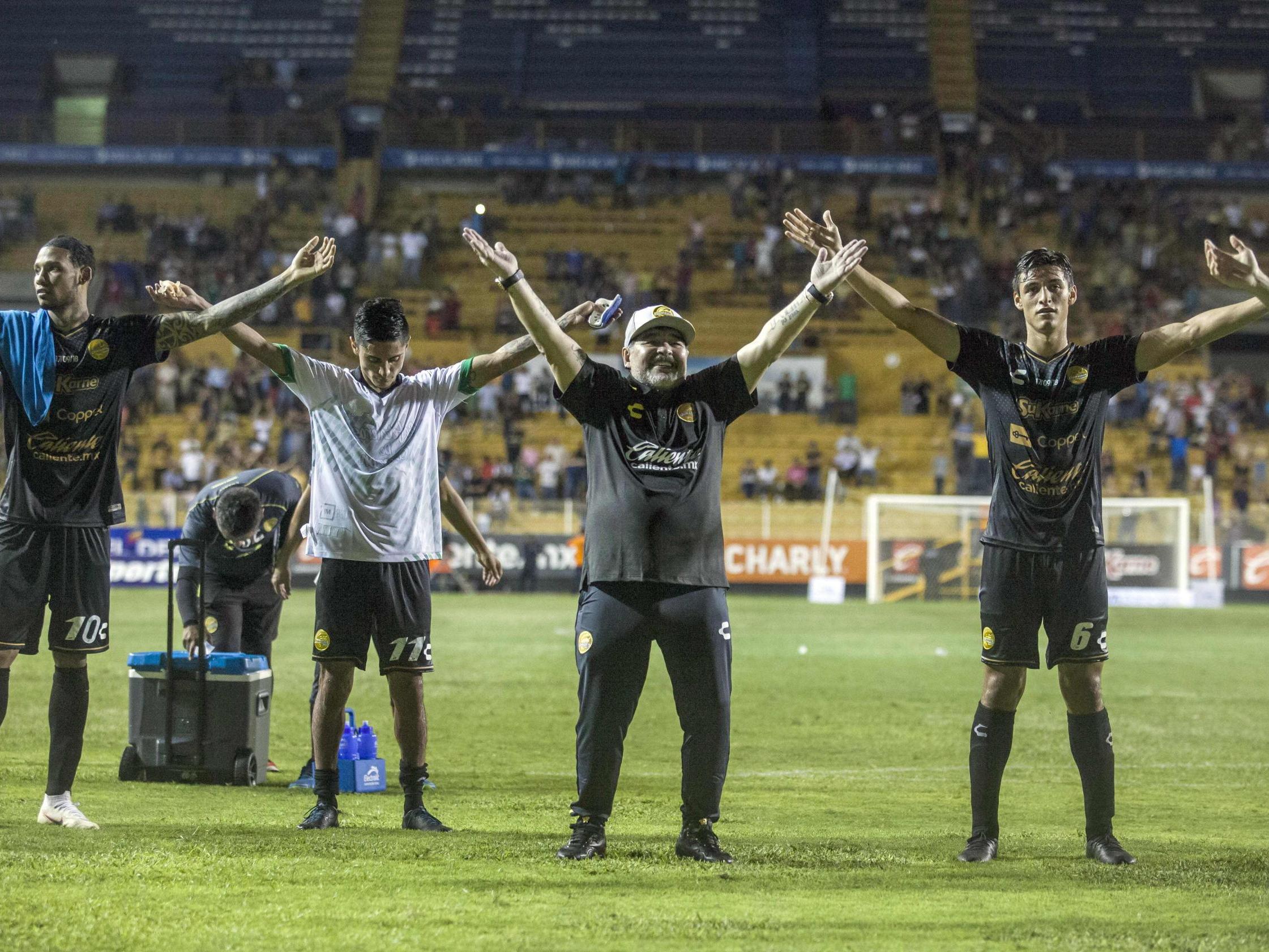 The delighted 57-year old joined players and fans doing the Viking thunderclap on the field after the game