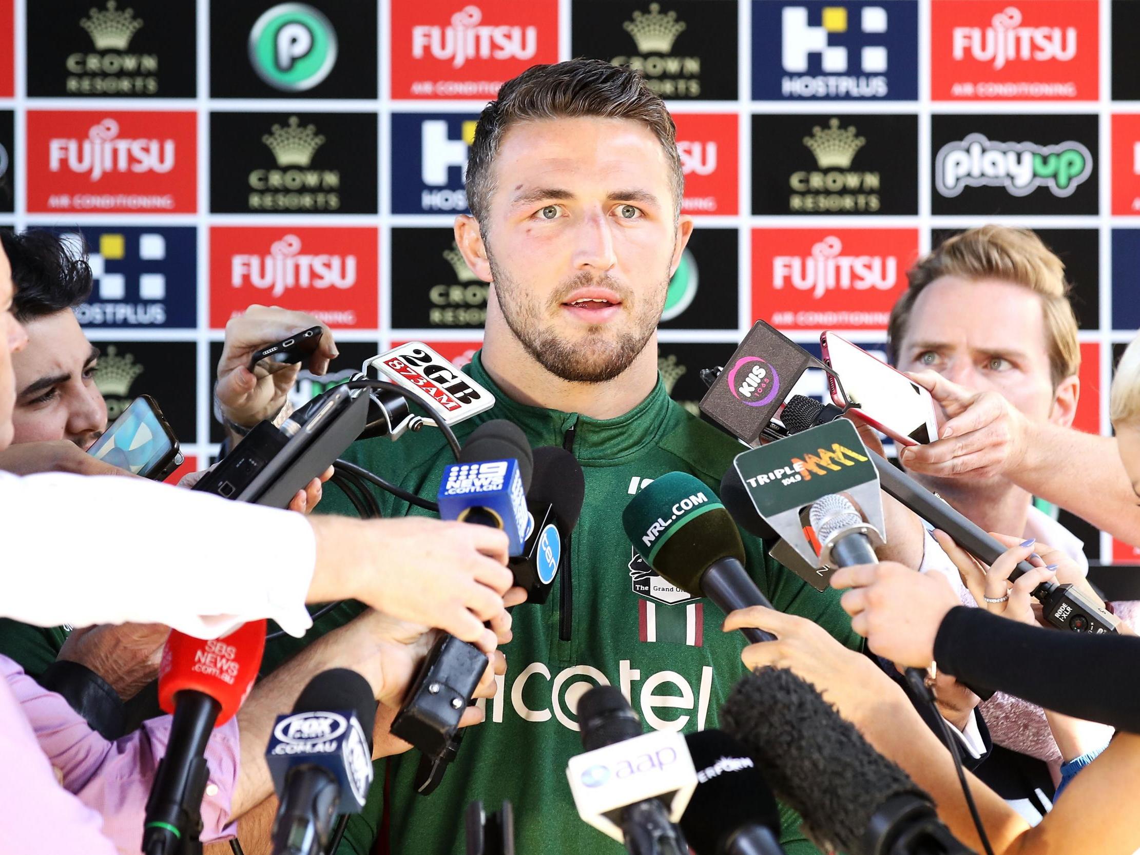 Burgess speaks to the press