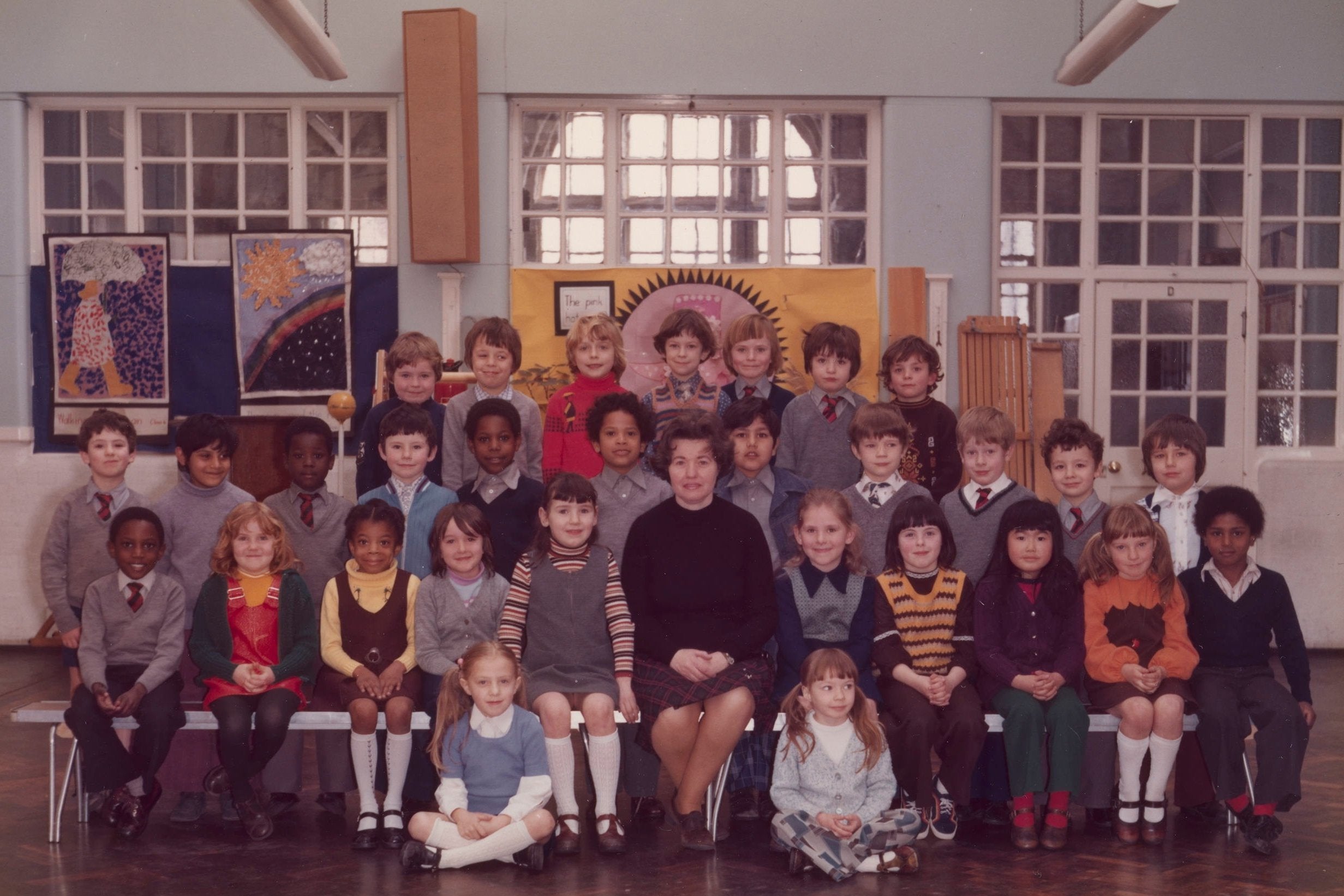 Artist Steve McQueen (middle row, fifth left) will embark on an ambitious contemporary art project to create a portrait of all of London's Year 3 school pupils