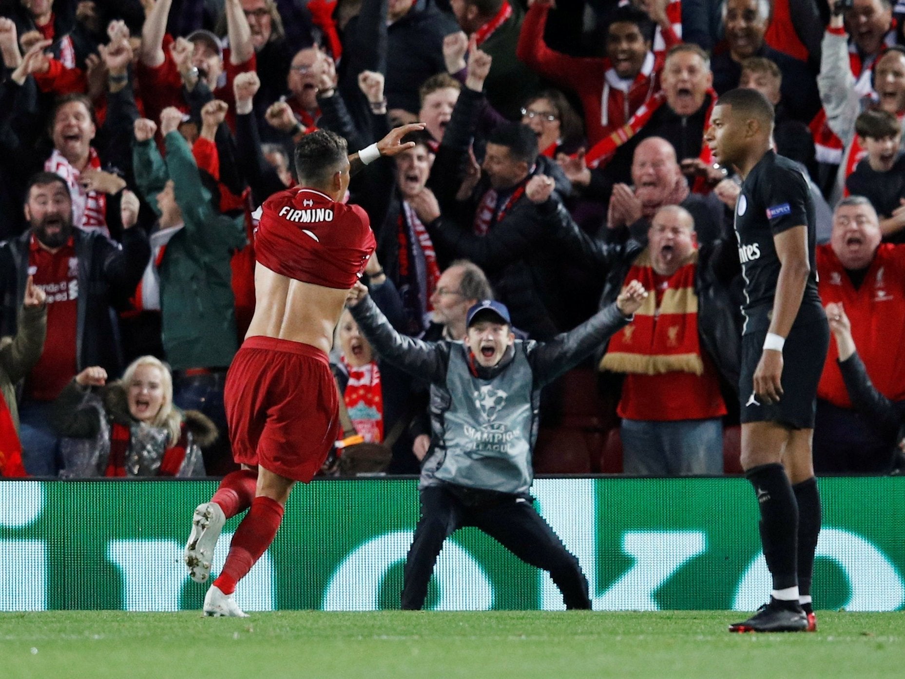 Roberto Firmino peels away to celebrate his winning strike