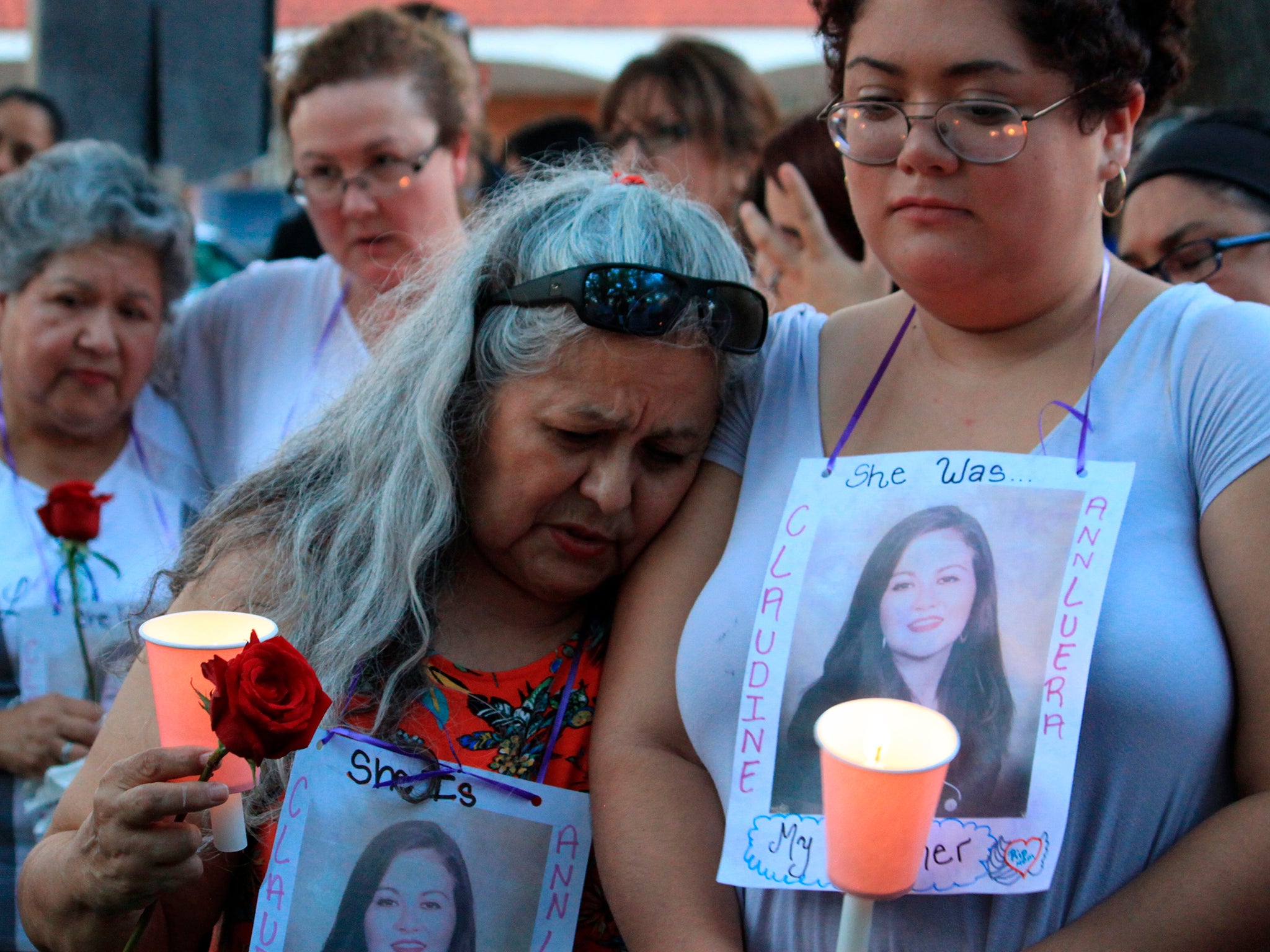 Family members and friends of four women who authorities say were killed by a US Border Patrol agent gathered for a candlelight vigil at a park in Texas on Tuesday 18 September