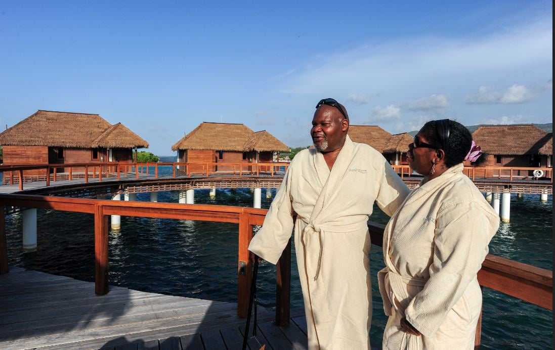 A university cleaner described as “the jolliest man” has enjoyed a holiday to Jamaica (Sandals )