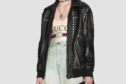 The brand pairs it with a leather jacket and jeans (Gucci)