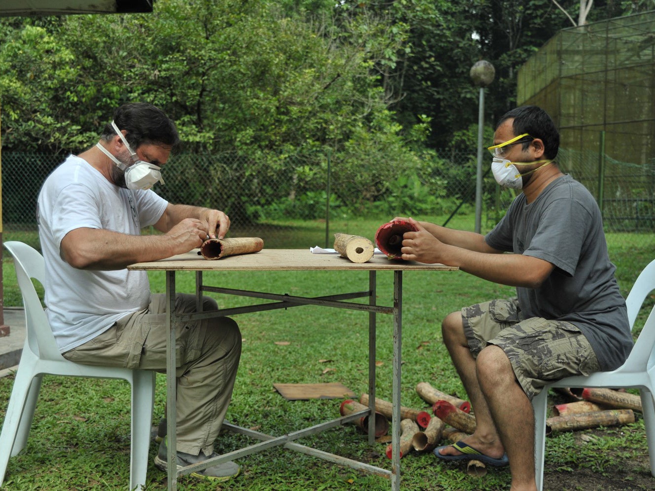 Wasser (left) and his team sample ivory from tusks in Malaysia in 2014.