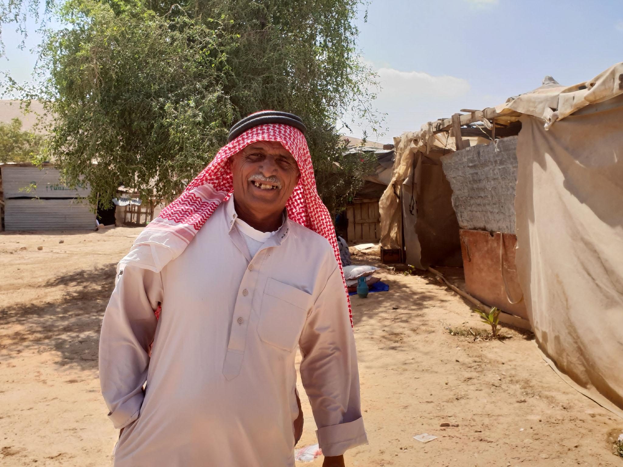 Sixty-year-old Palestinian Abu Yussef Abu Dahuk in front of the shack where he lives in the West Bank