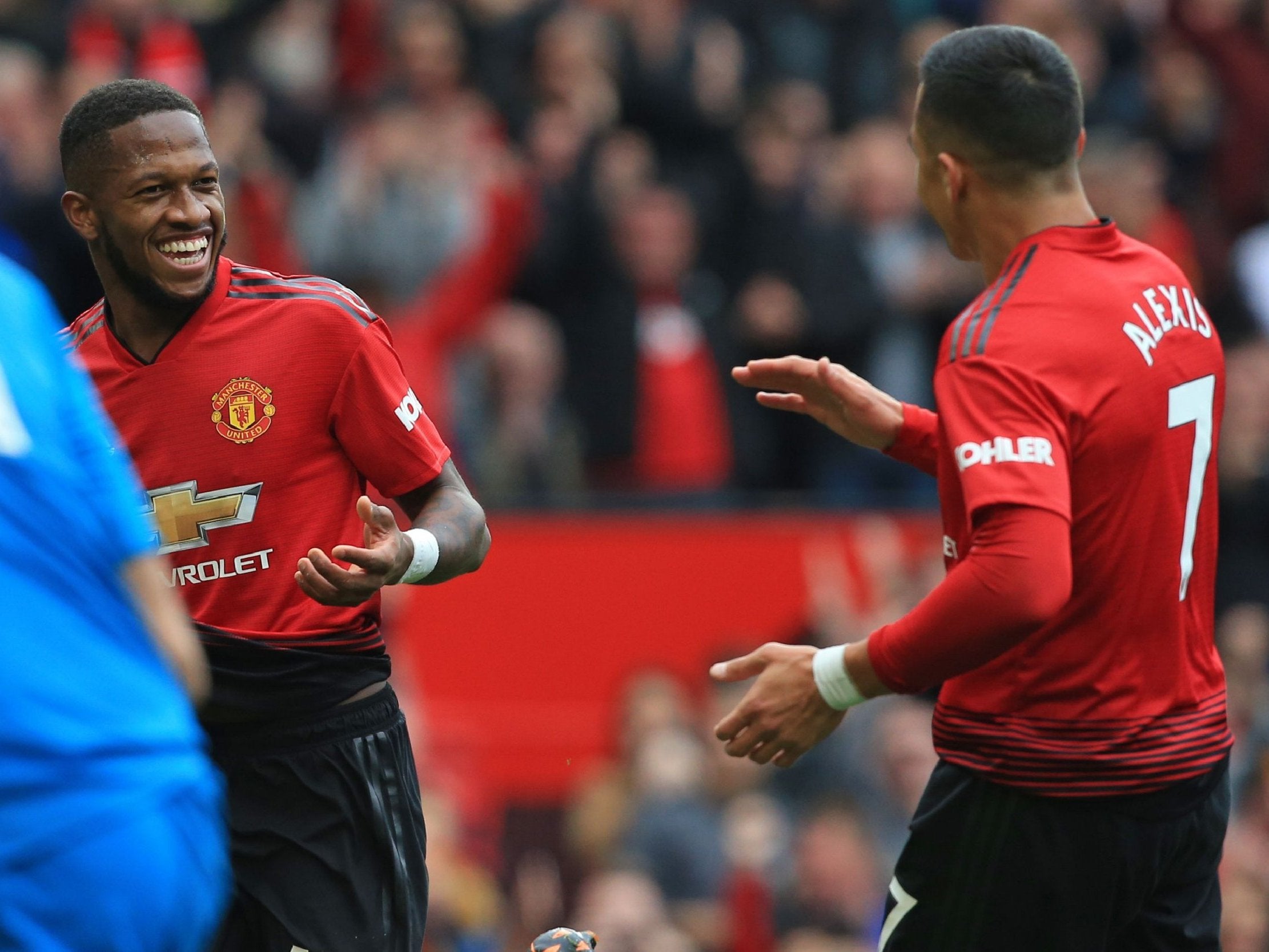 Fred celebrates his opener at Old Trafford