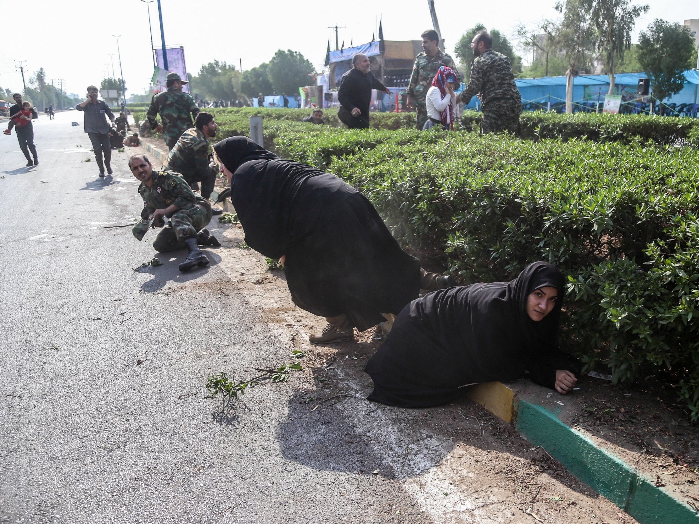 Iranian soldiers, women, and children in Ahvaz on Saturday