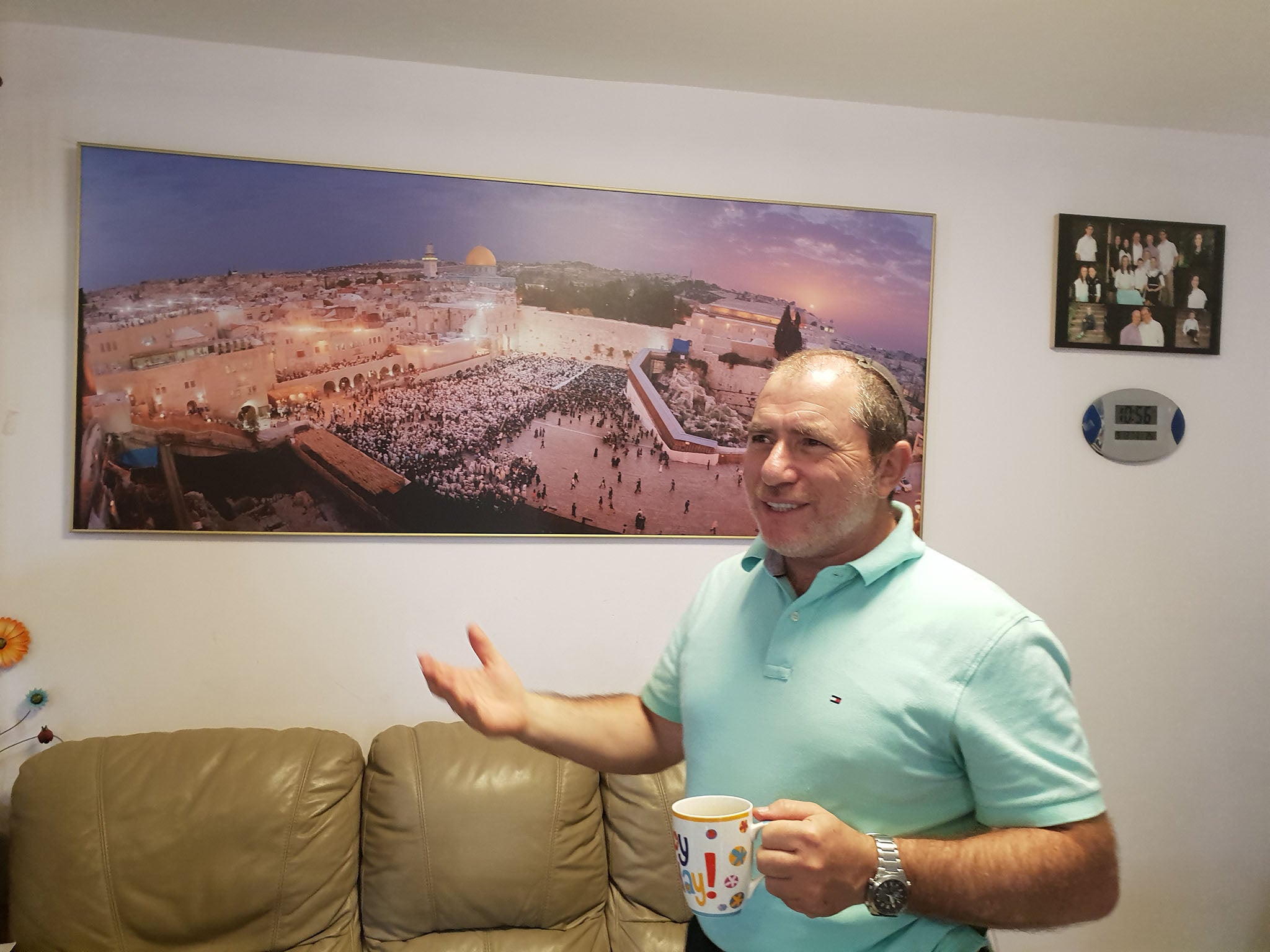 Beit El Jewish settler Chaim Silberstein stands in his home east of Jerusalem