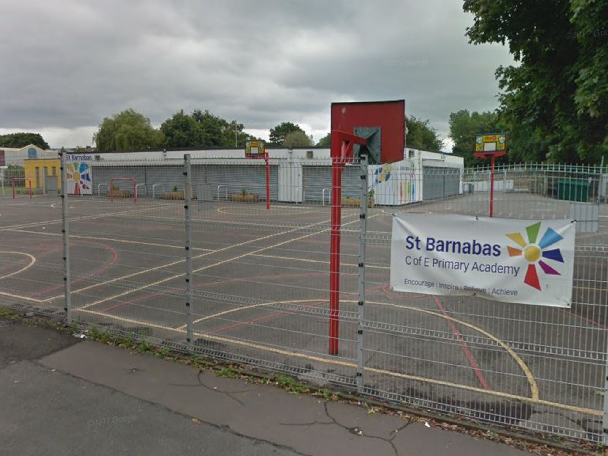 Men attacked car as woman was collecting children from St Barnabas C of E Primary Academy in Openshaw