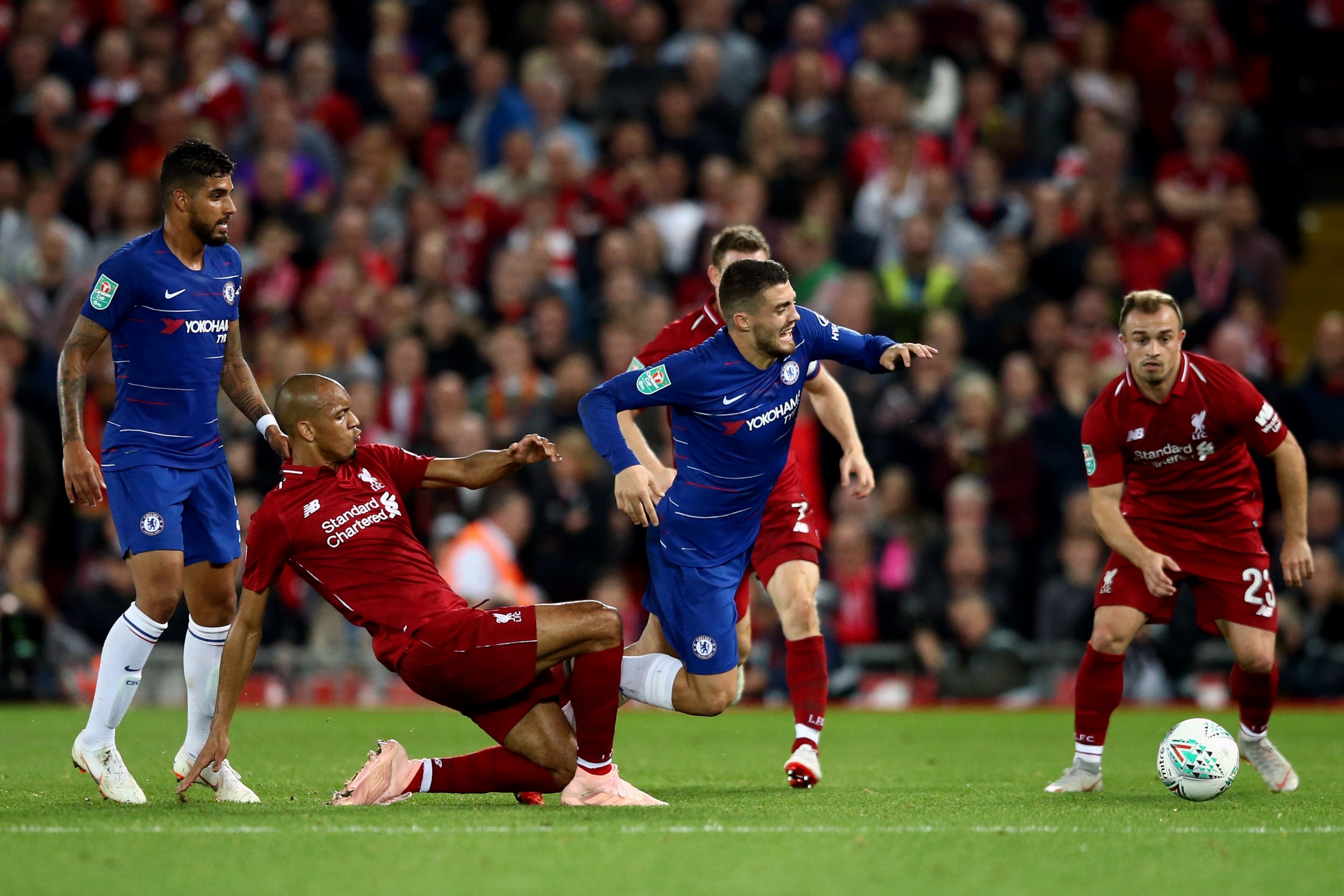 Fabinho fouls Chelsea's Mateo Kovacic