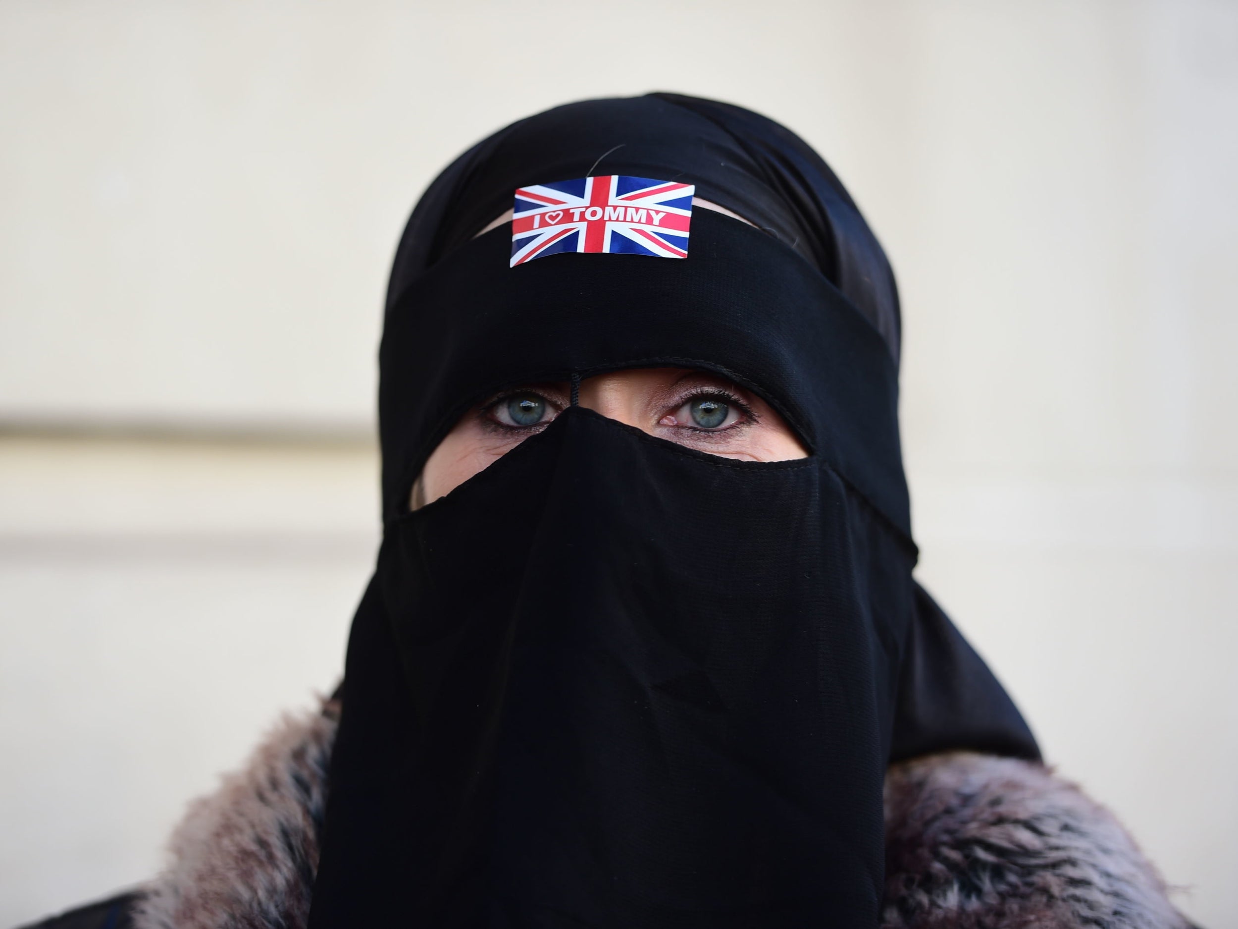 A Tommy Robinson supporter in London after former English Defence League (EDL) leader Tommy Robinson left the Old Bailey where his contempt of court case was adjourned