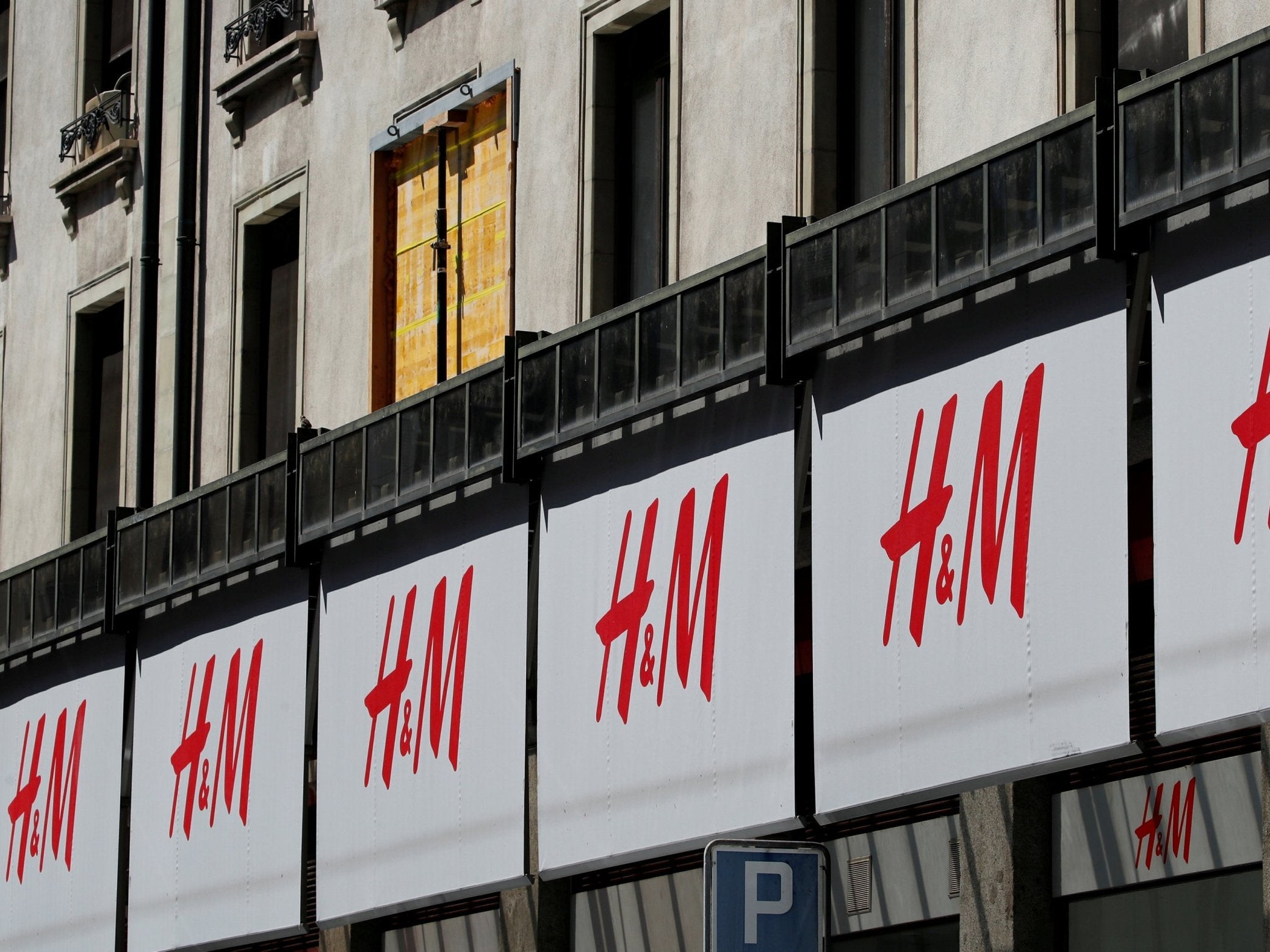 H&M said it will not have to cut costs in order to shift unsold stock