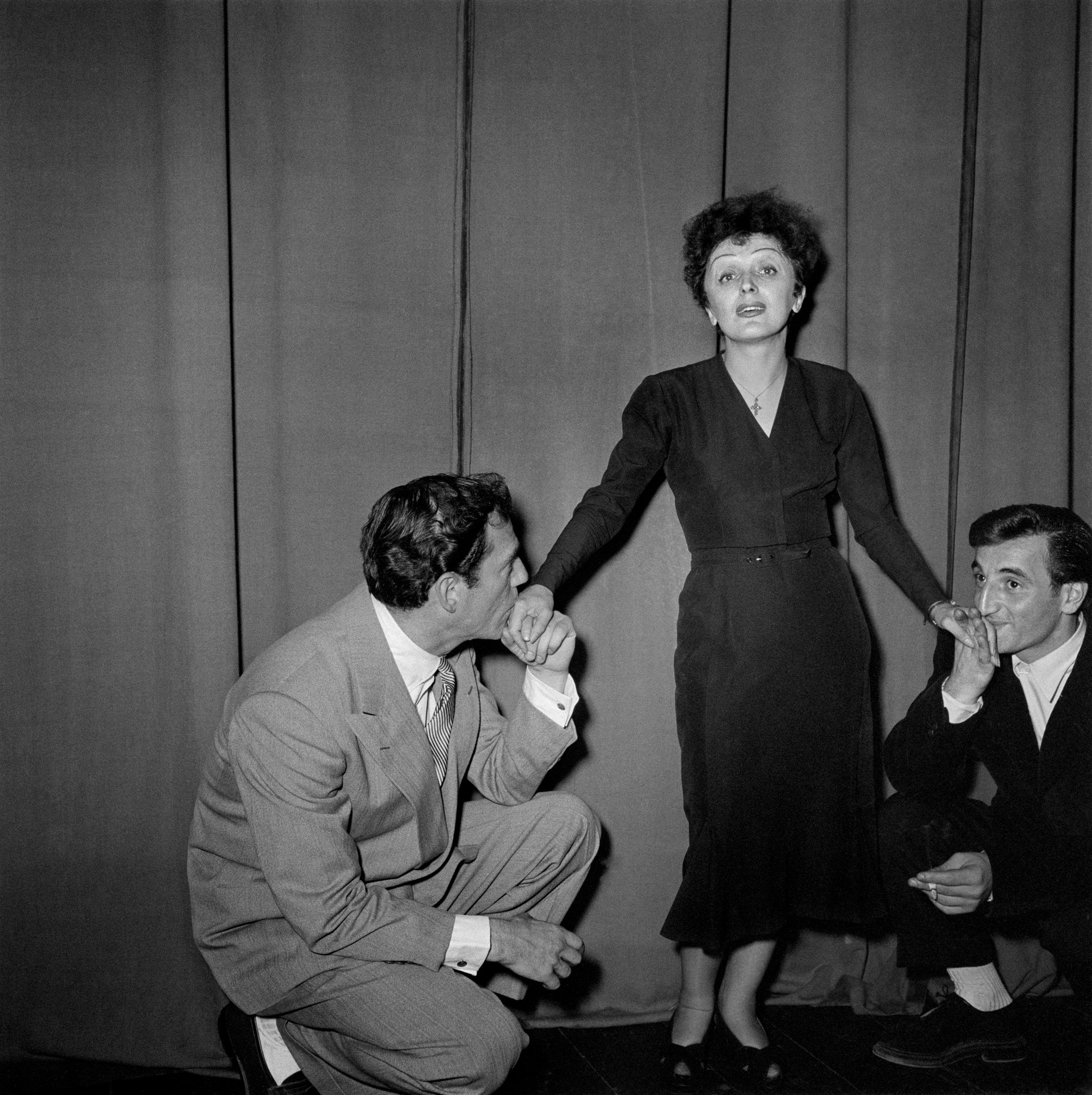 Charles Aznavour (right) with Edith Piaf and American actor Eddie Constantine (left) in 1950 (AFP/Getty)