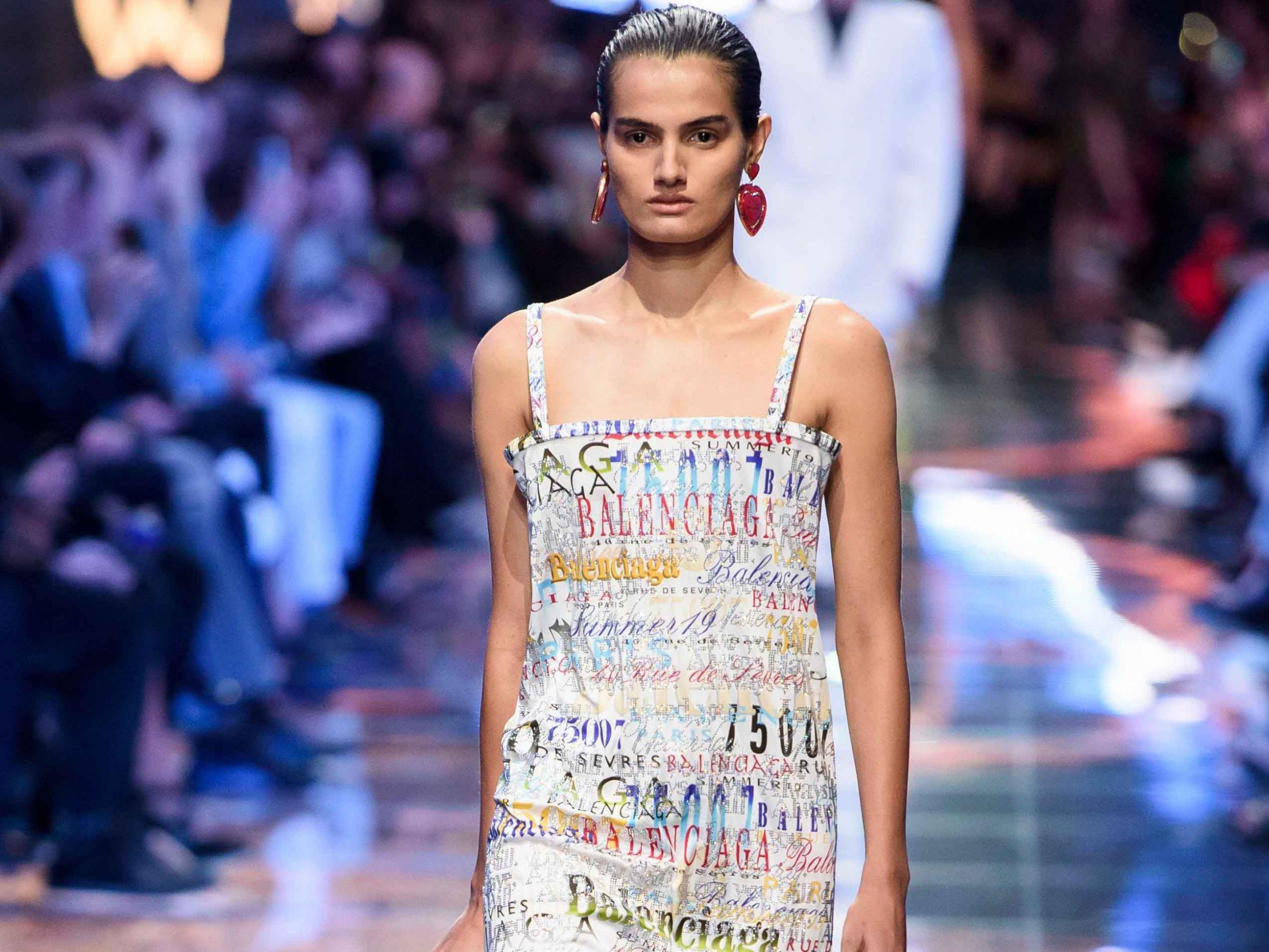 At Balenciaga a model closed the show wearing a dress emblazoned with the brand's logo in Comic Sans