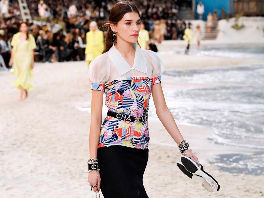 Models walked across a man-made beach for Chanel spring/summer 2019