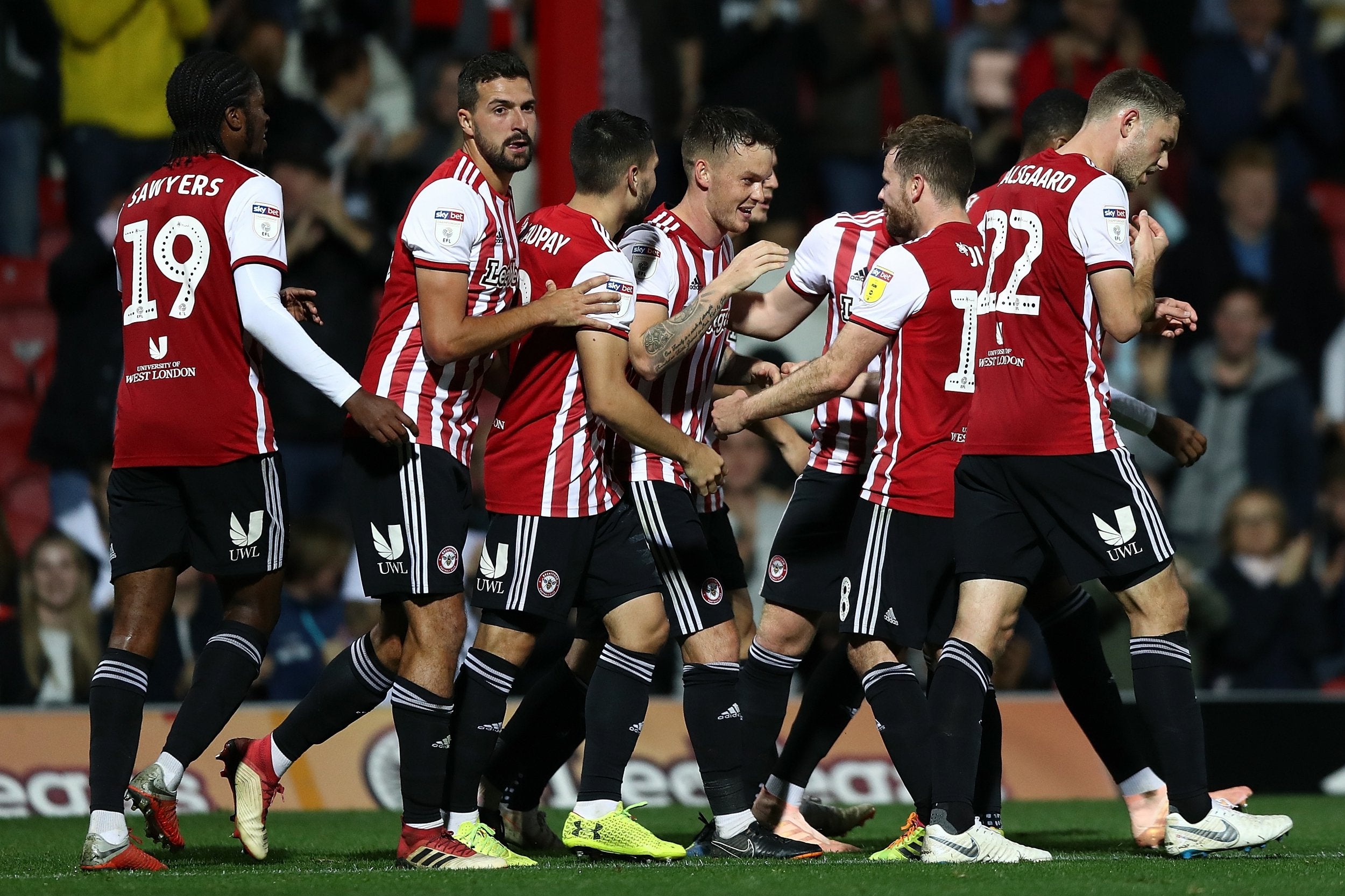 Josh McEachran, centre, celebrates his goal from a free-kick