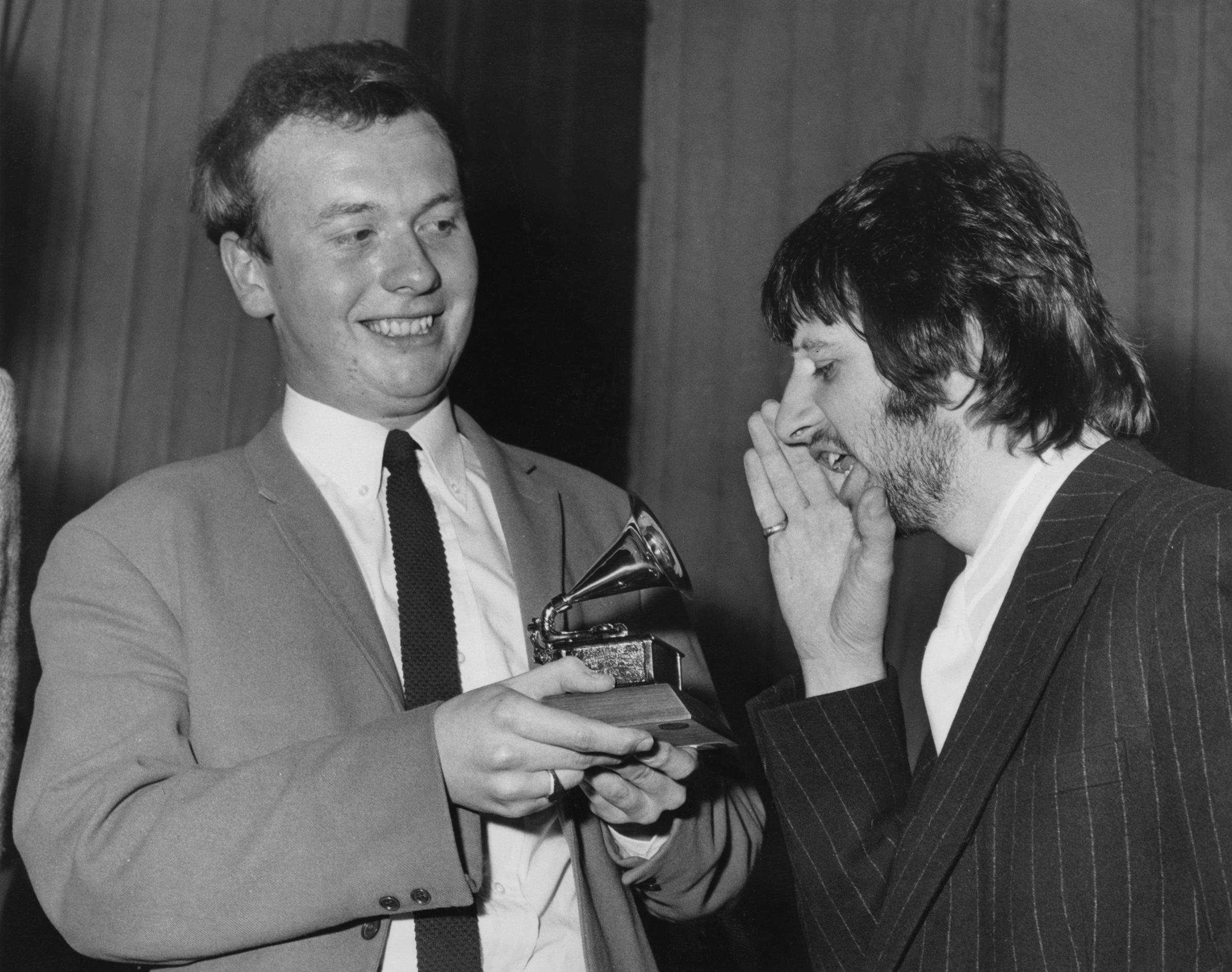 Ringo Starr congratulates Emerick on his Grammy award received in March 1968 for his work on the previous year's masterpiece ‘Sgt Pepper’