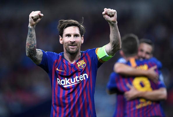 Lionel Messi celebrates after Barcelona's third