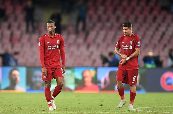 Georginio Wijnaldum and Roberto Firmino of Liverpool stand disappointed