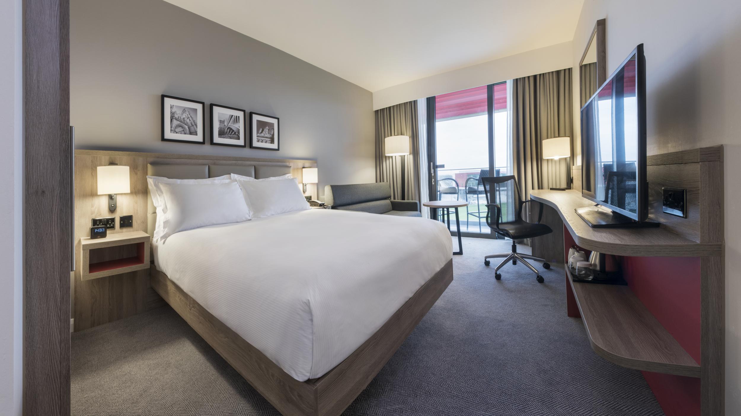 The King Family room at the Hilton Garden Inn Manchester, complete with Old Trafford pitch view