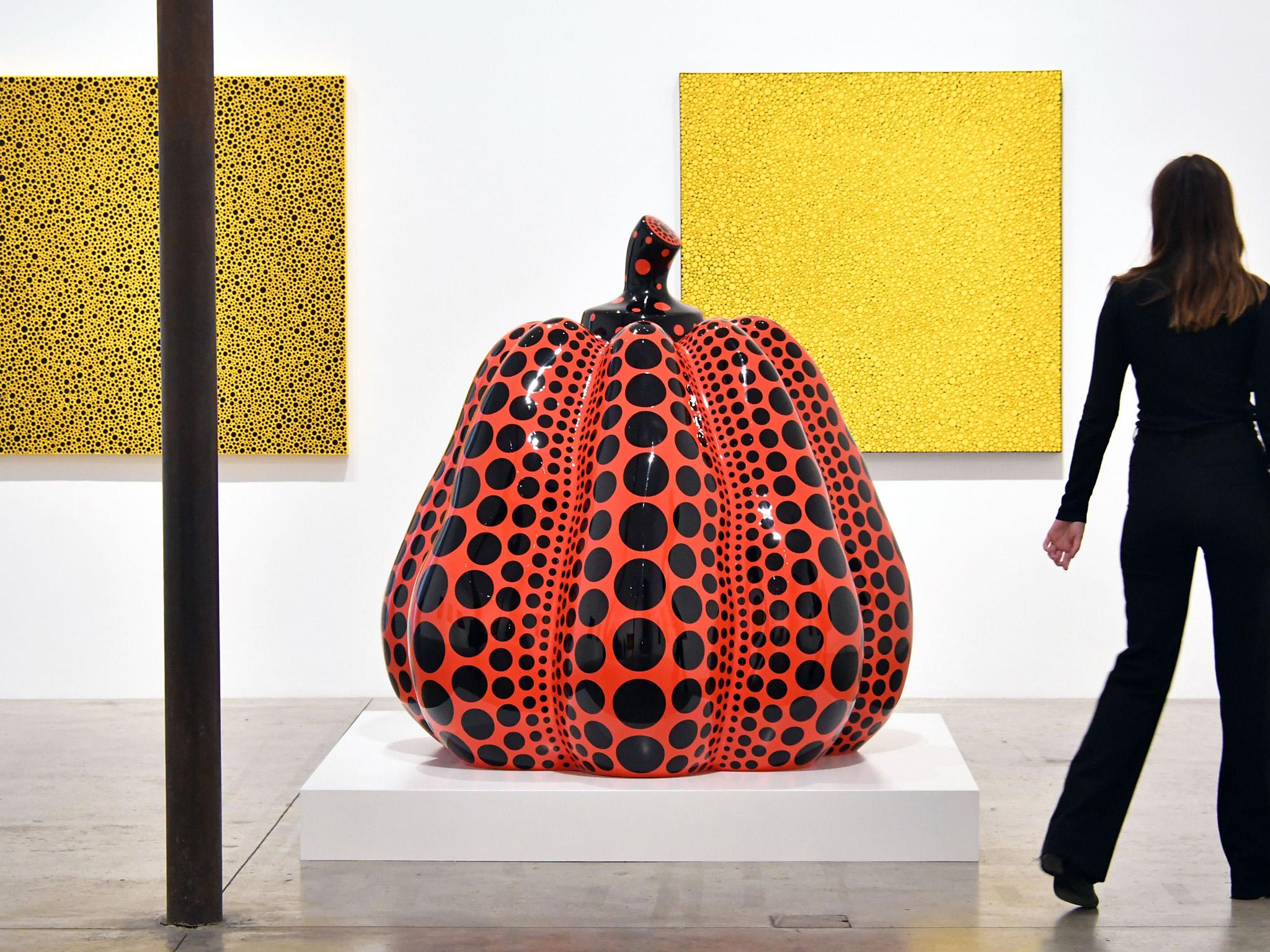 Dots Obsession (two pictures) and Pumpkin, part of The Moving Moment When I Went To The Universe at Victoria Miro in London