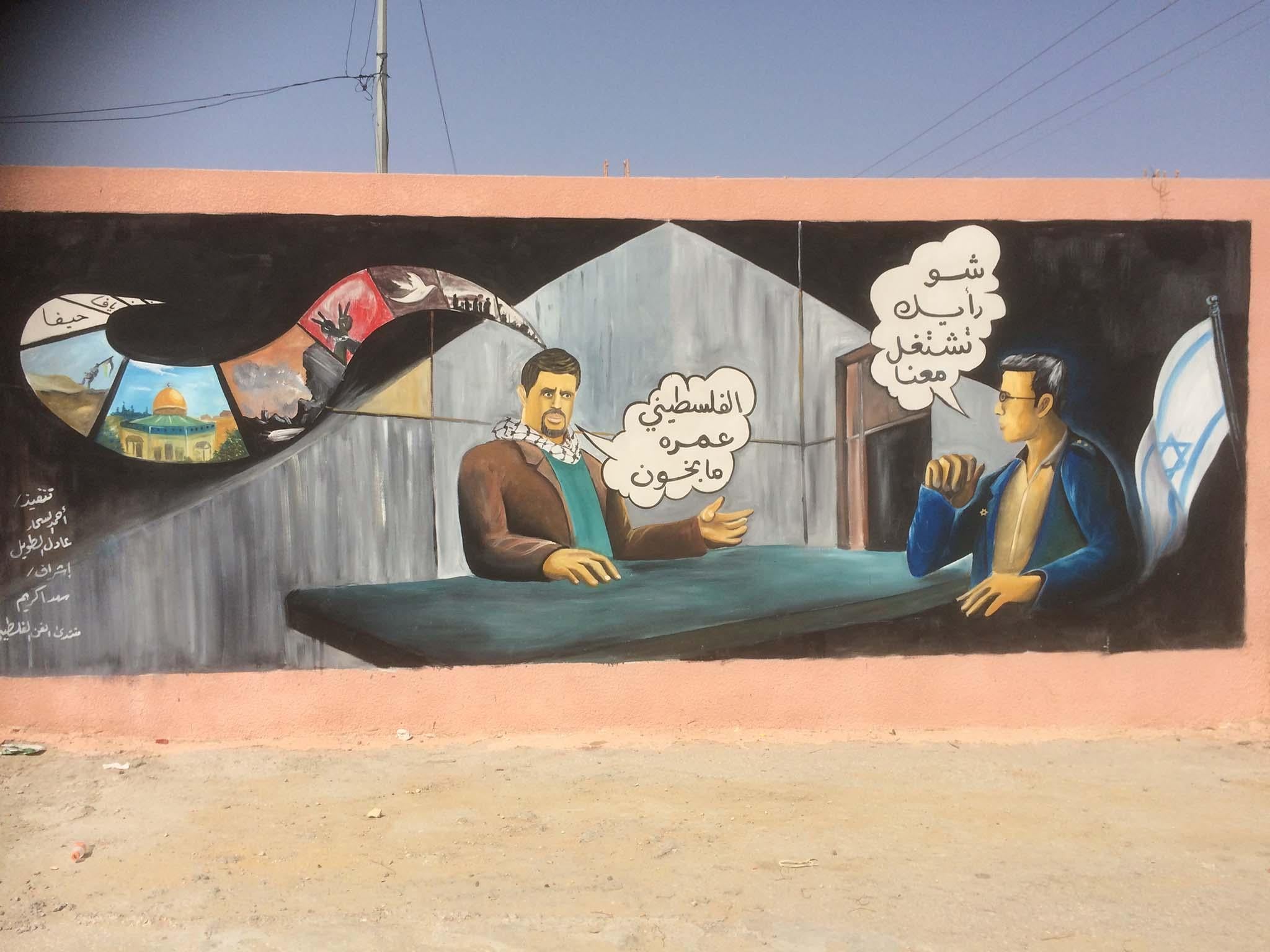 A mural in Gaza warns residents against collaboration with Israel (Donald Mcintyre)