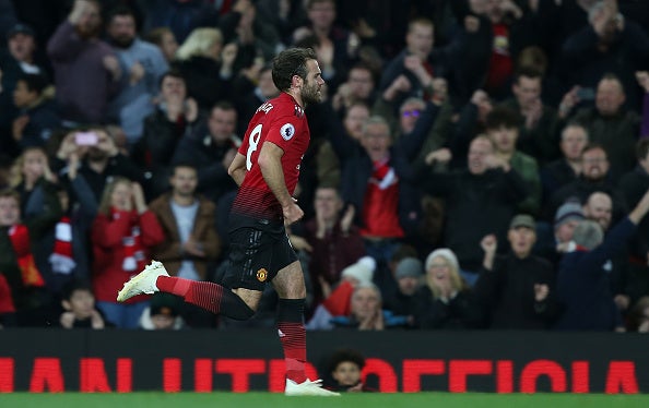 Juan Mata celebrates scoring United's first