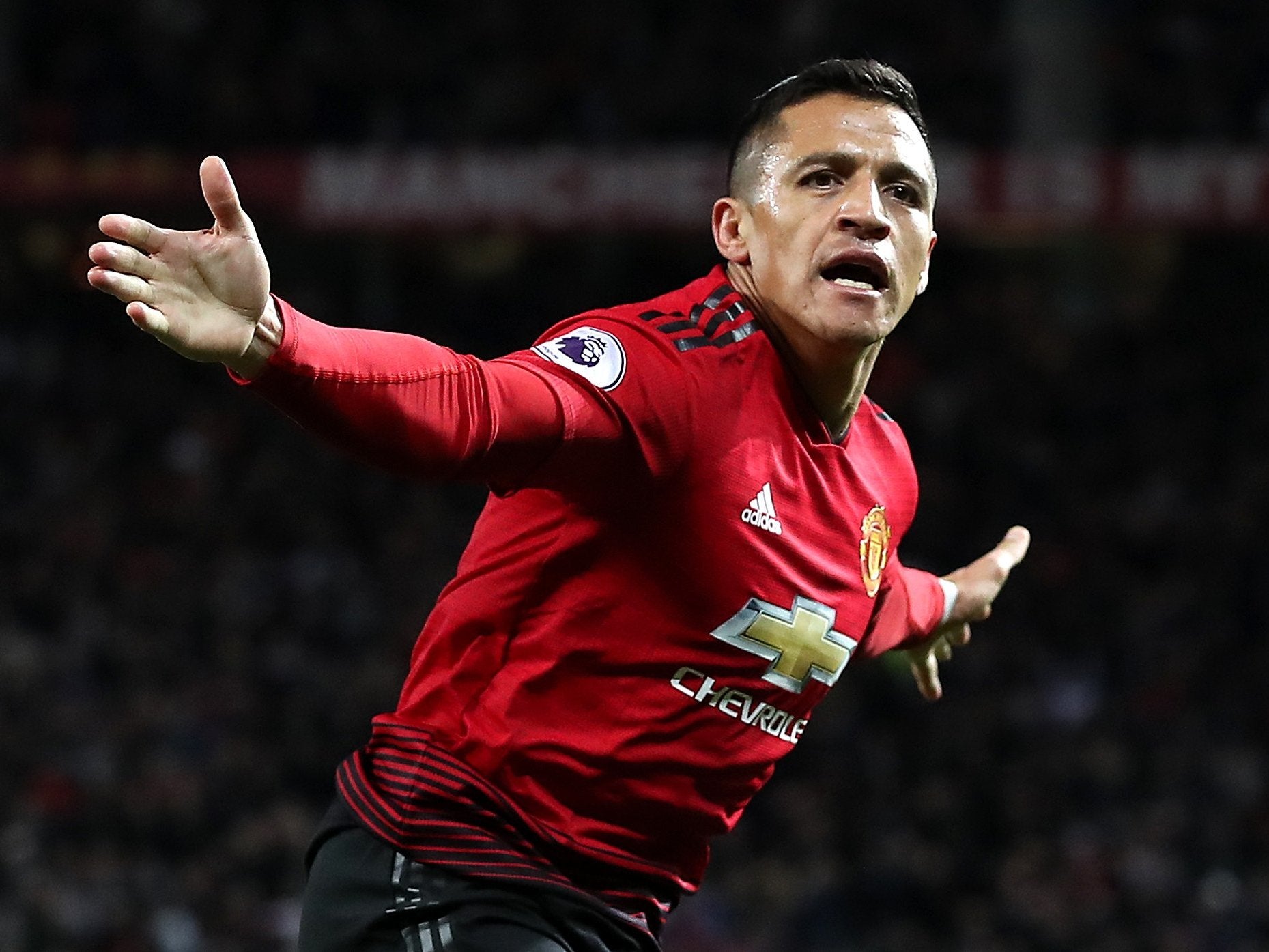 Alexis Sanchez celebrates his crucial winning goal