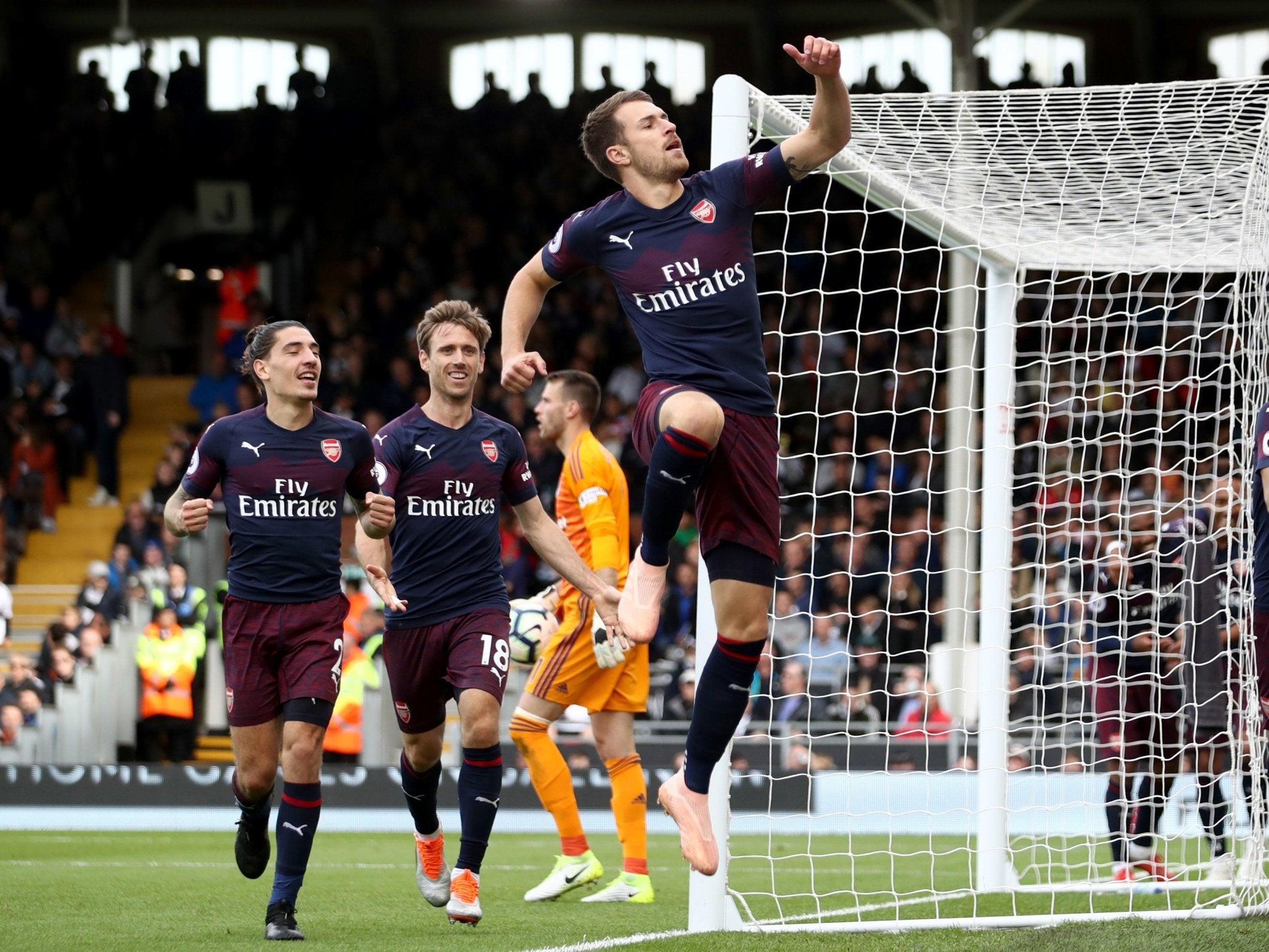 Aaron Ramsey celebrates scoring Arsenal's third goal against Fulham