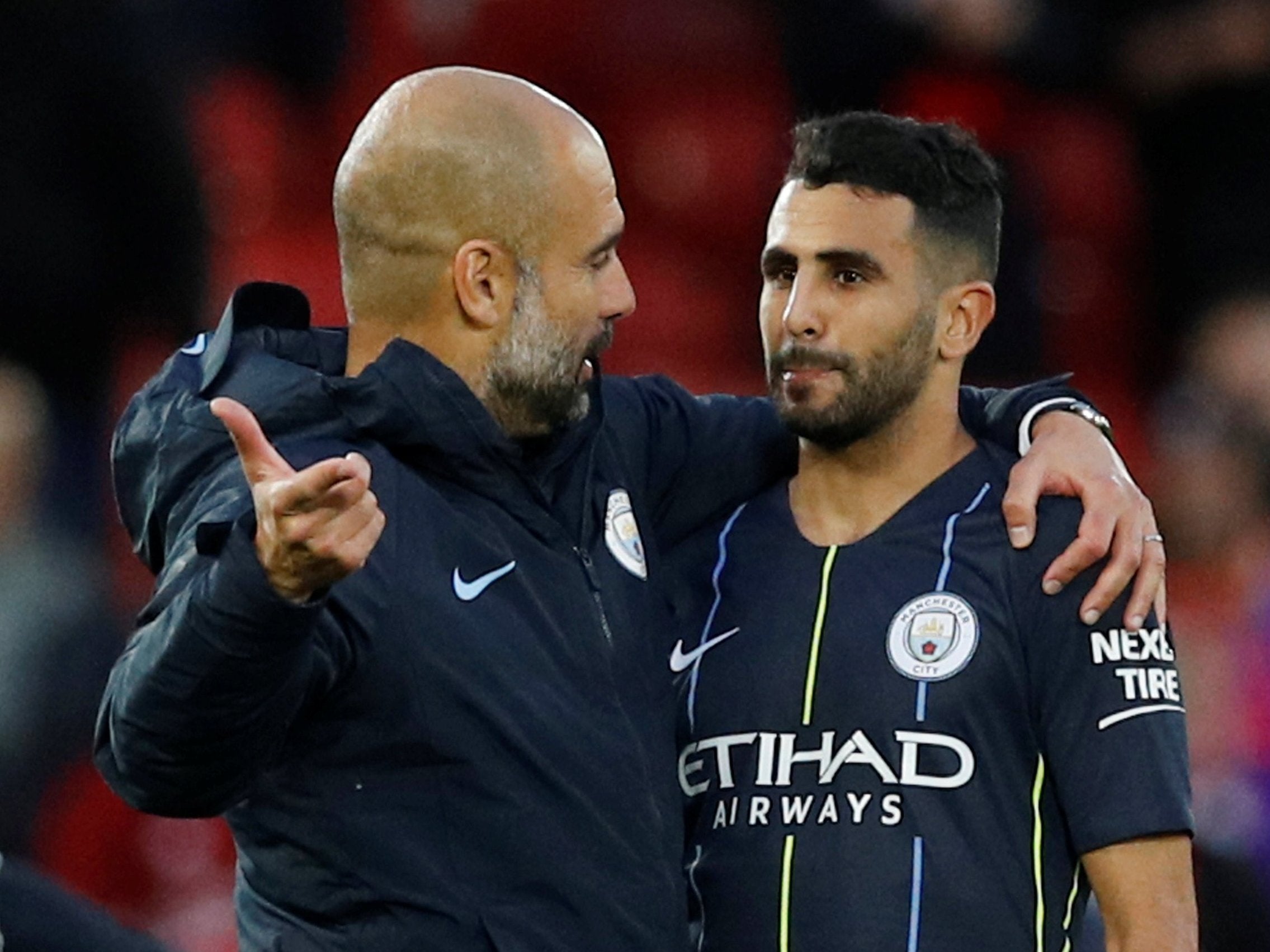 Pep Guardiola consoles Riyad Mahrez after Manchester City's 0-0 draw with Liverpool