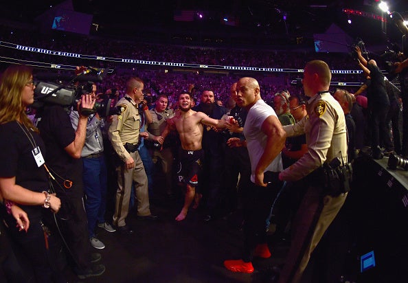 Khabib was escorted away by police after the brawl