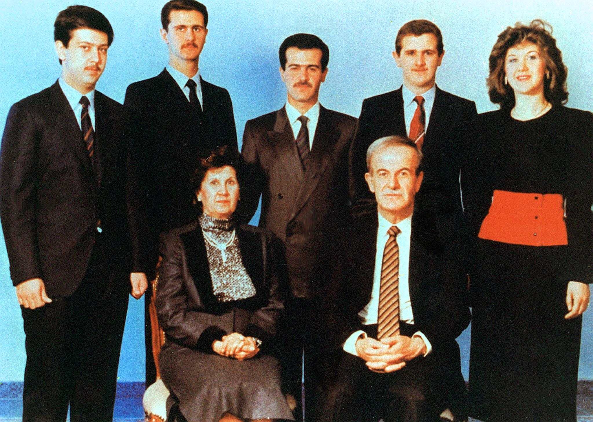 Hafez (seated) with Bashar (second from left) and the rest of the Assad family