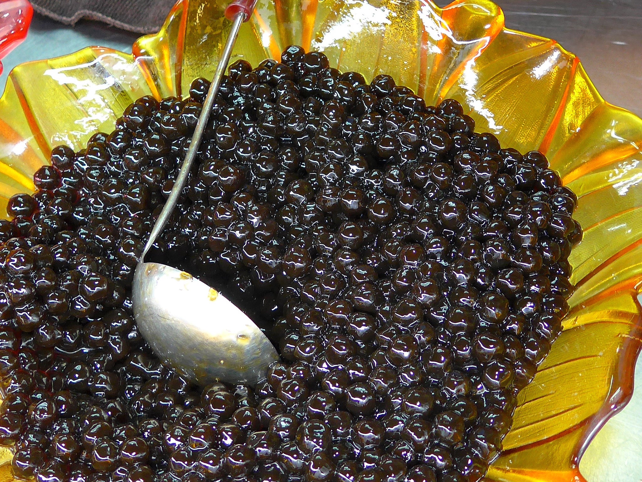 Glistening black tapioca pearls