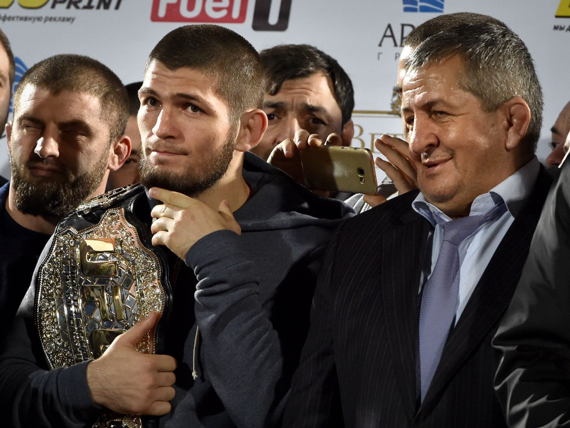 Abdulmanap Nurmagomedov (right) promised 'much stronger' punishment for his son
