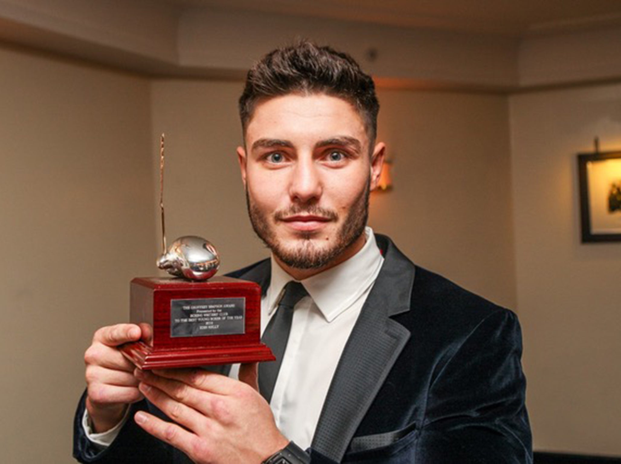 Josh Kelly with his award