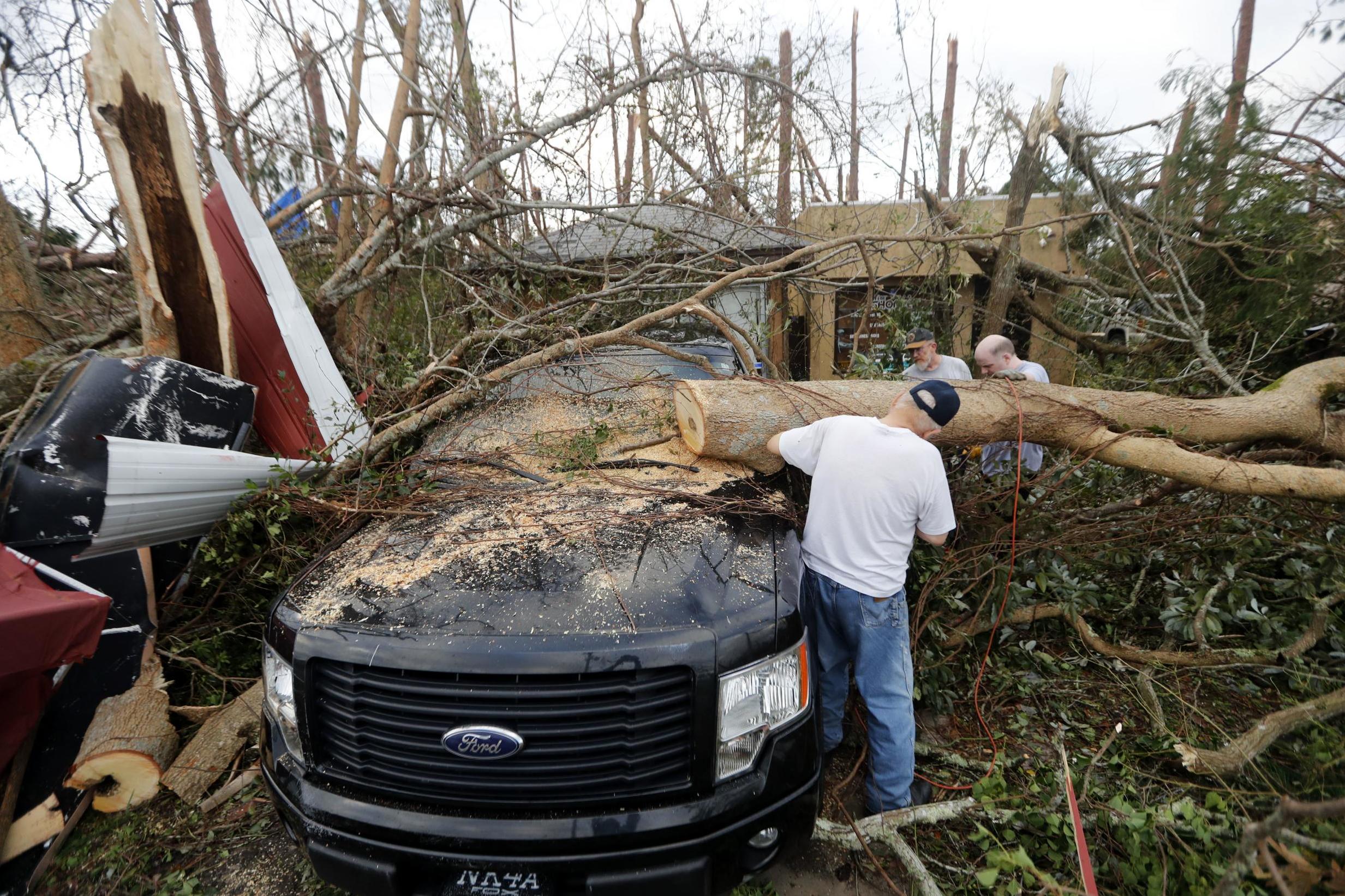 People begin to clear up after of Hurricane Michael in Panama City, Florida