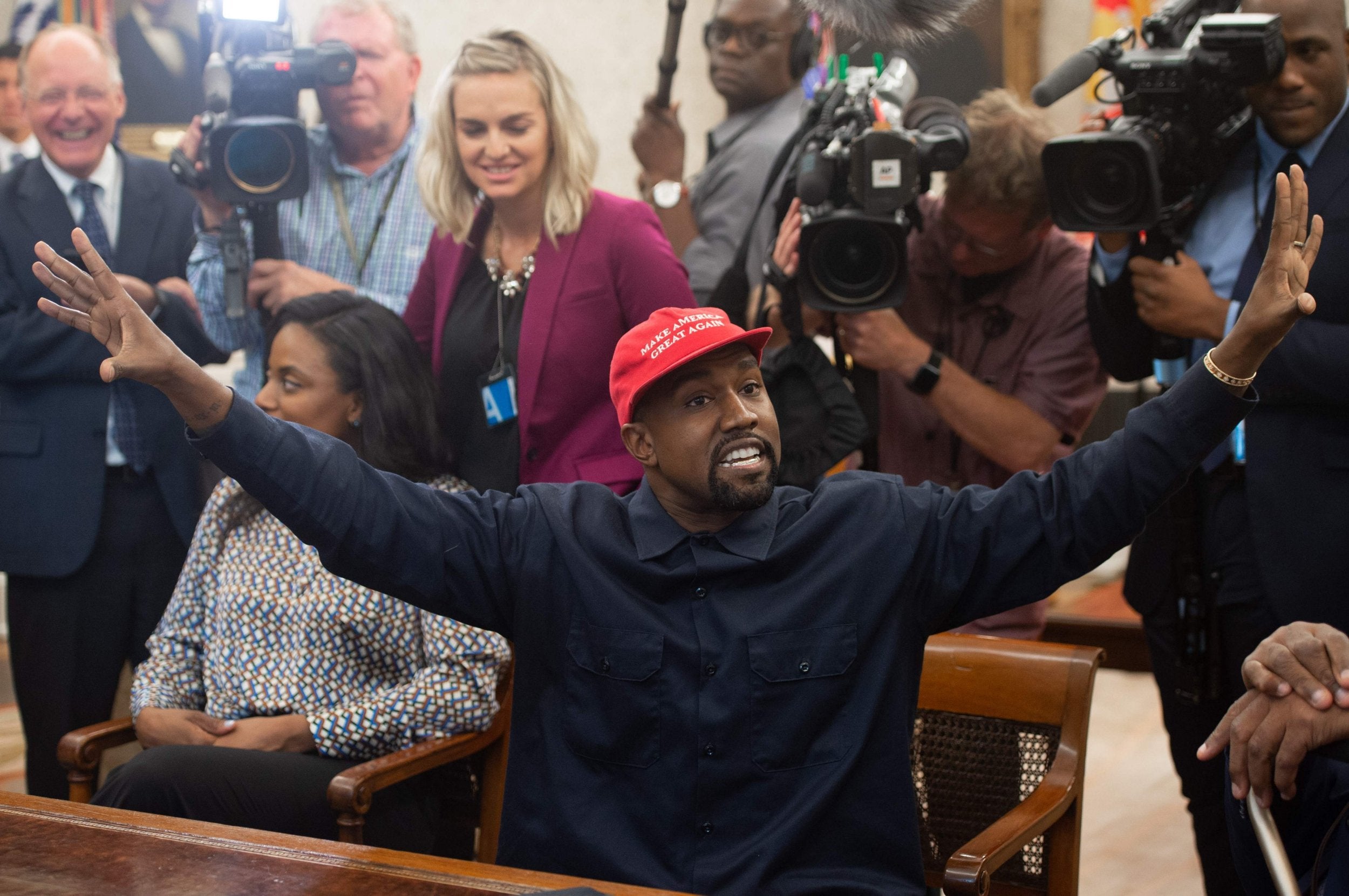 Kanye West meets with US President Donald Trump in the Oval Office of the White House