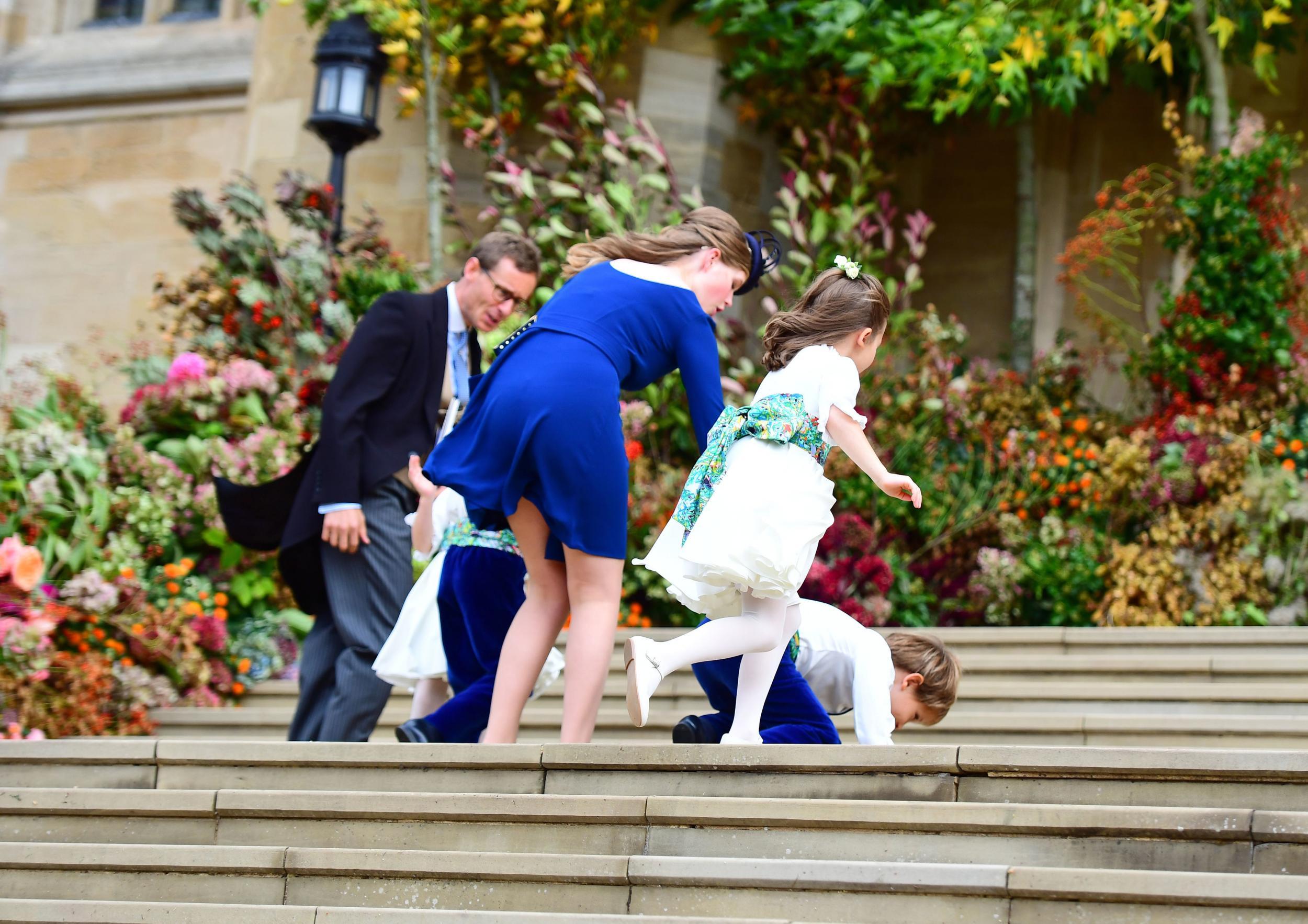 The wind tackled guests as they entered (Getty)