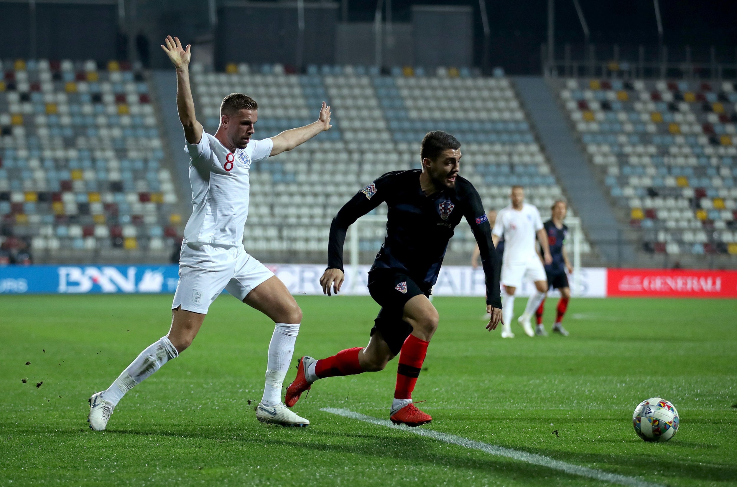 Mateo Kovacic tries to hold off Jordan Henderson