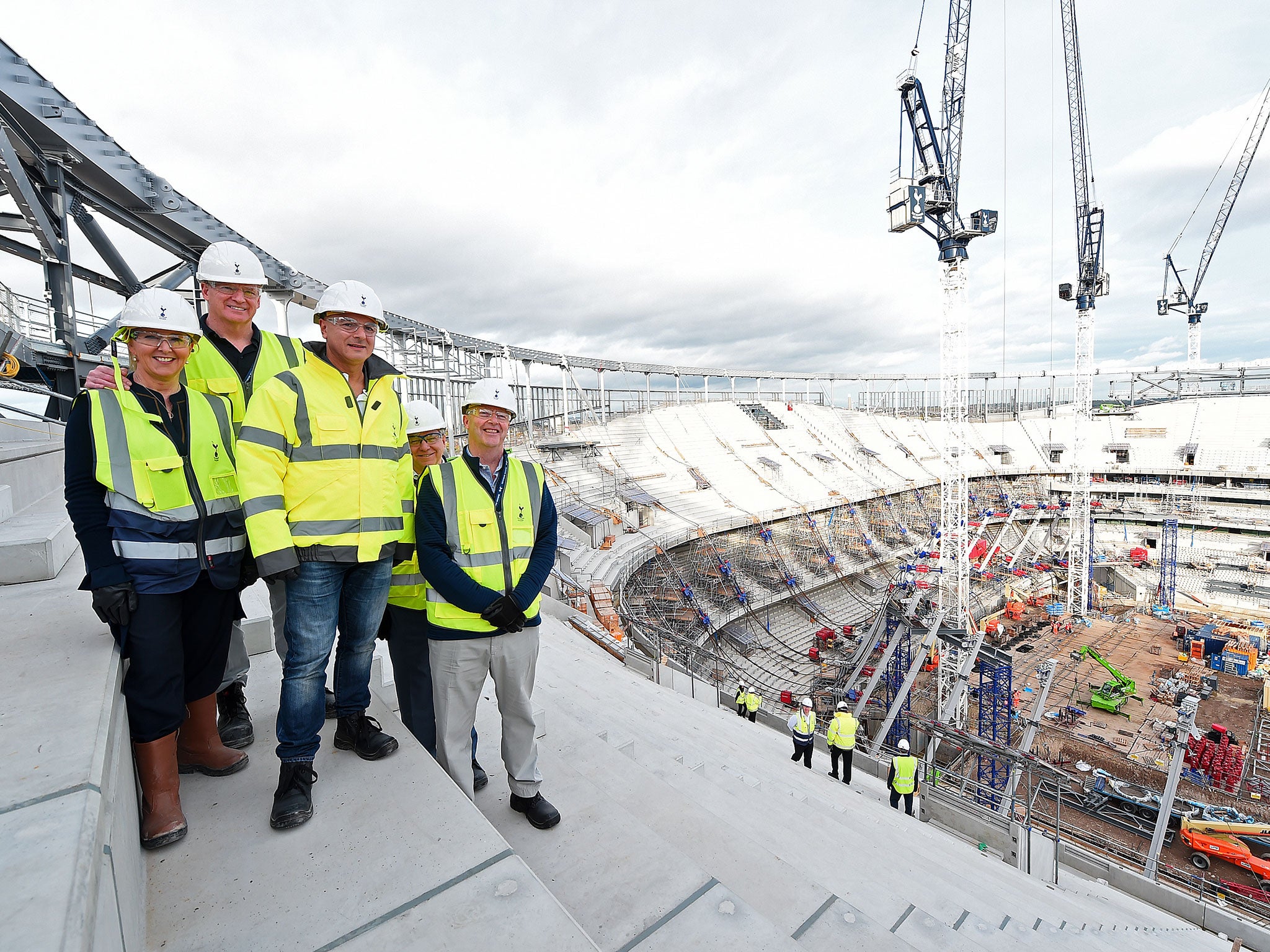 Mark Waller (far right) visit the new White Hart Lane ground (Getty )