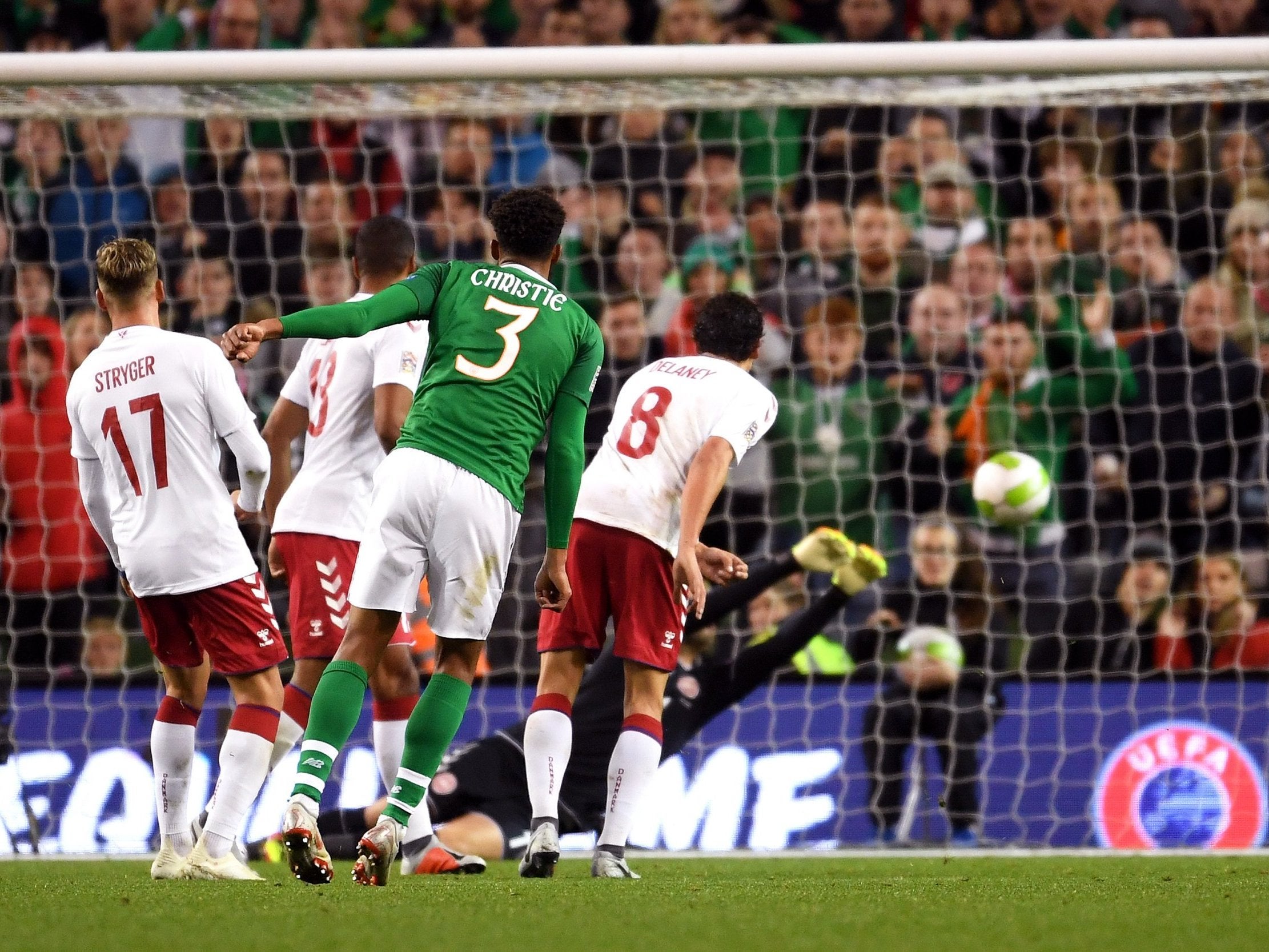 Cyrus Christie with a shot on goal for Ireland