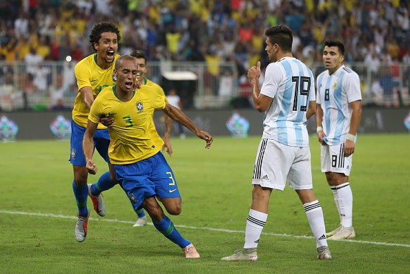 Miranda celebrates after his 90th minute goal