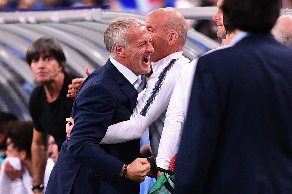 Didier Deschamps celebrates at the final whistle