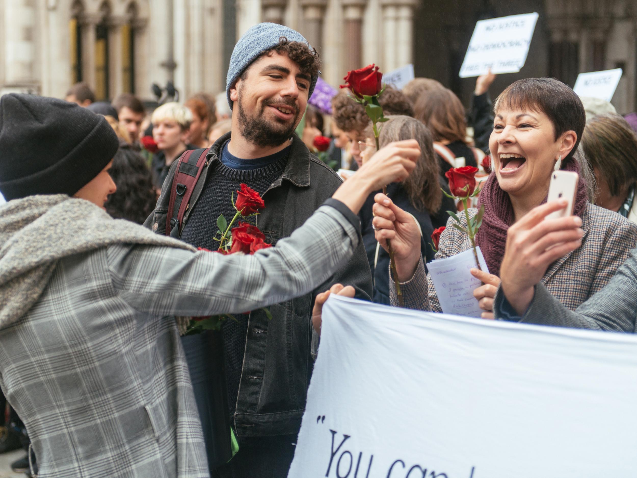 Green Party MP Caroline Lucas joined protesters outside the court ahead of the ruling