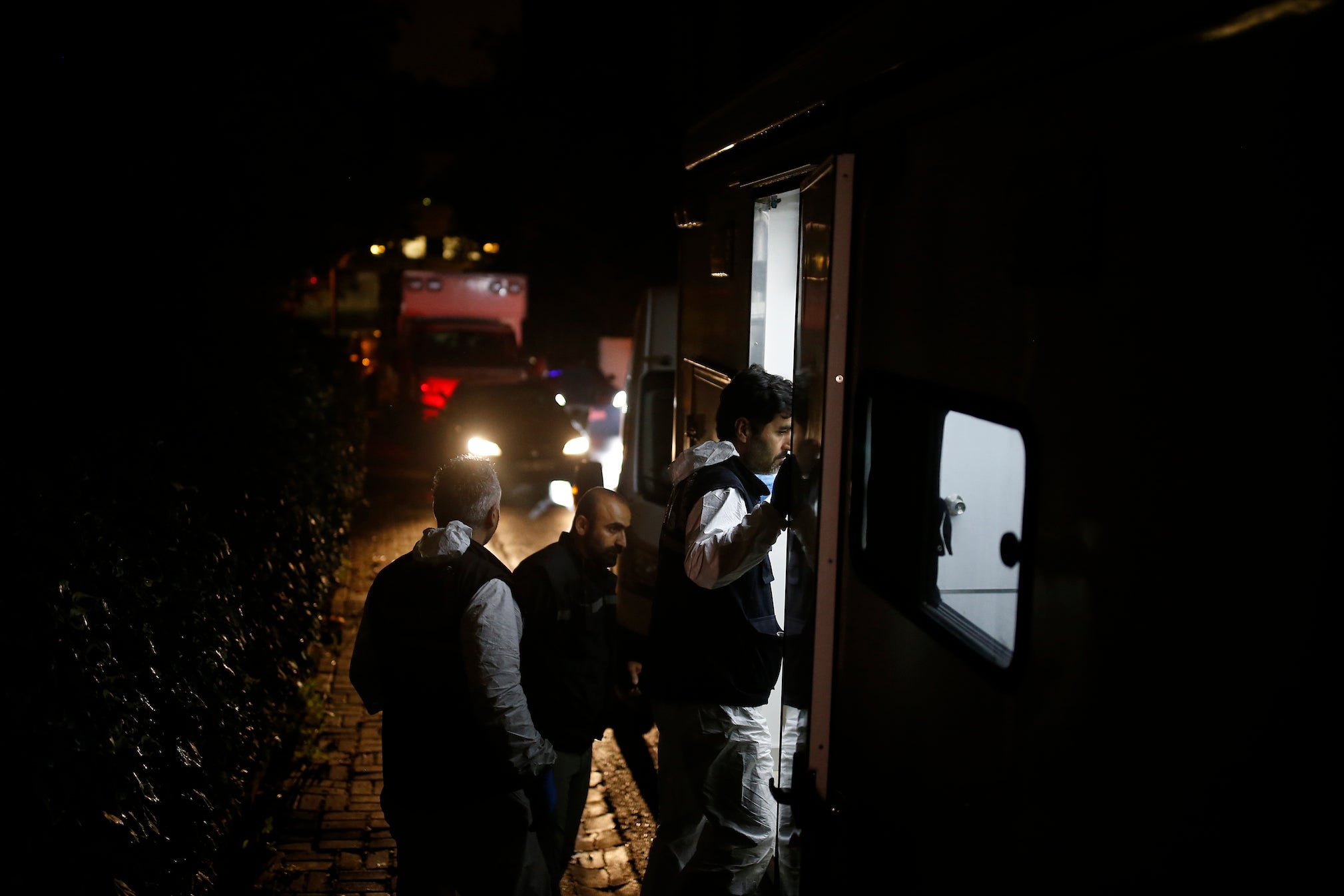 Turkish forensic officers arrive at the Saudi consulate to conduct a new search over the disappearance and alleged slaying of writer Jamal Khashoggi, in Istanbul, early Thursday.