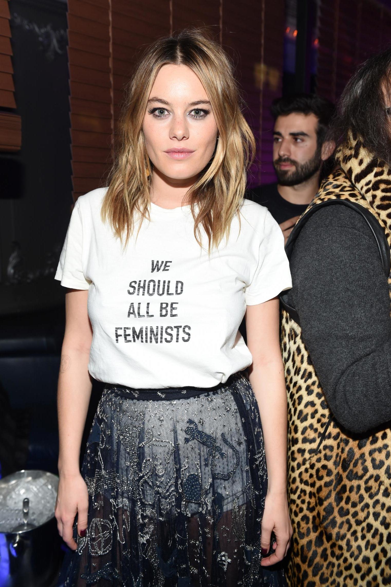 Model Camille Rowe wears Chiuri's popular 'We Should All Be Feminists' T-shirt