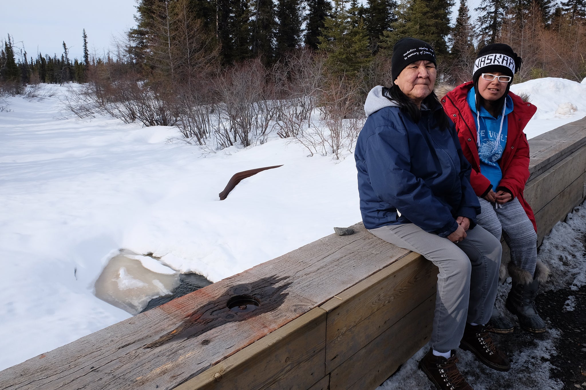 Susan Shecanapish and Rita Tooma participate in a healing walk in memory of loved ones who have died