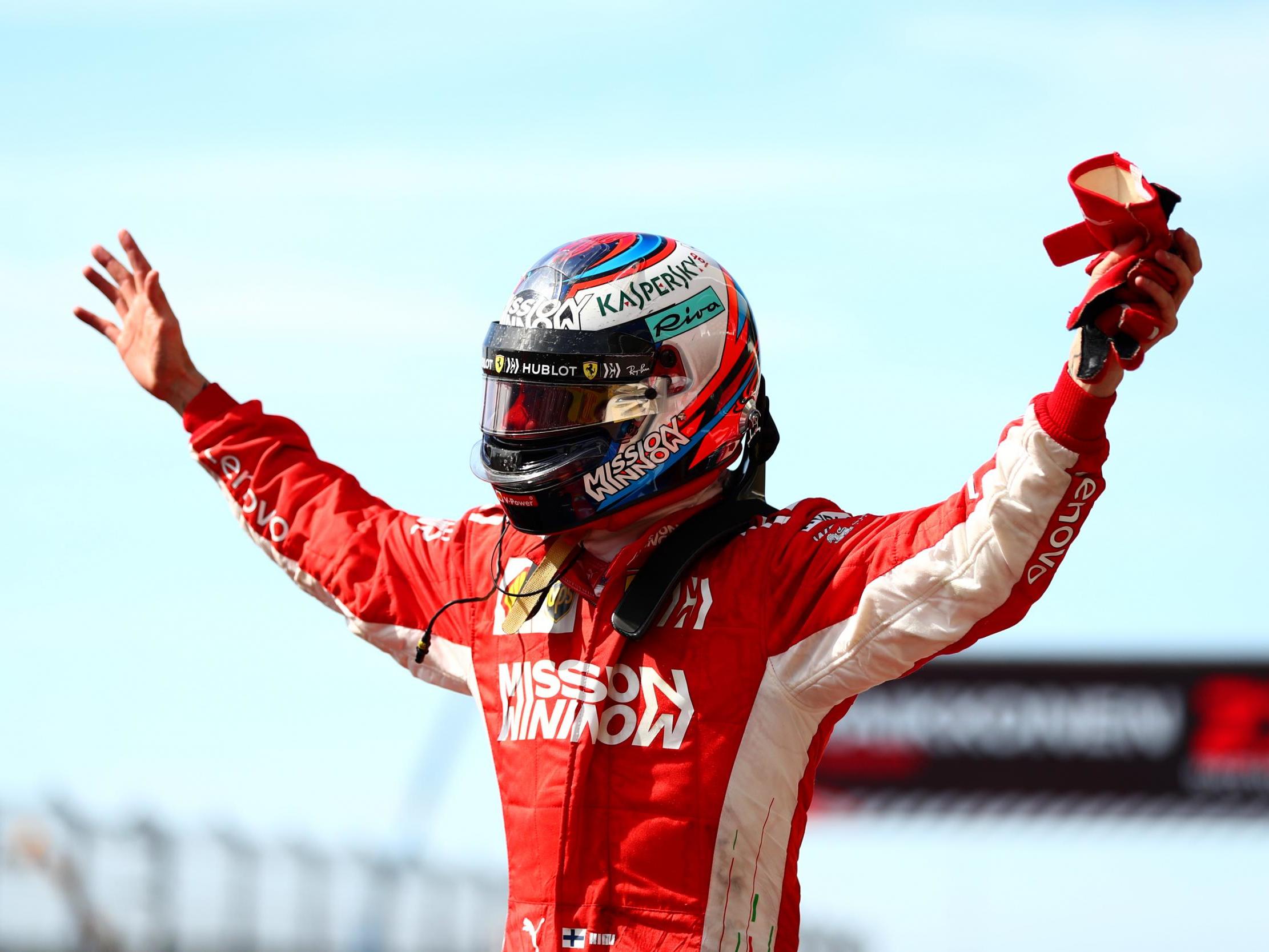 Kimi Raikkonen celebrates winning the United States Grand Prix
