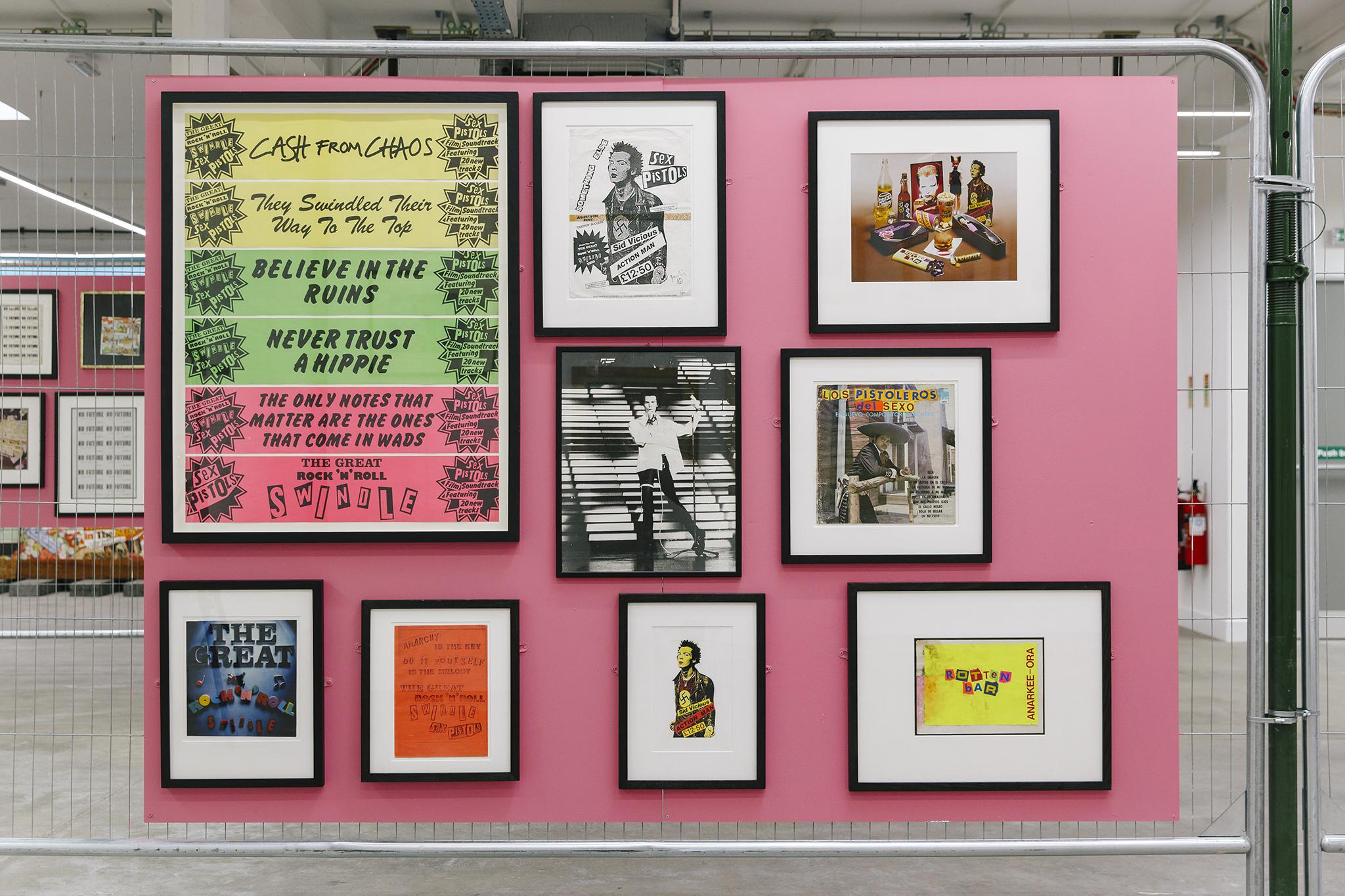 A board of Reid's slogans and artworks at his exhibition