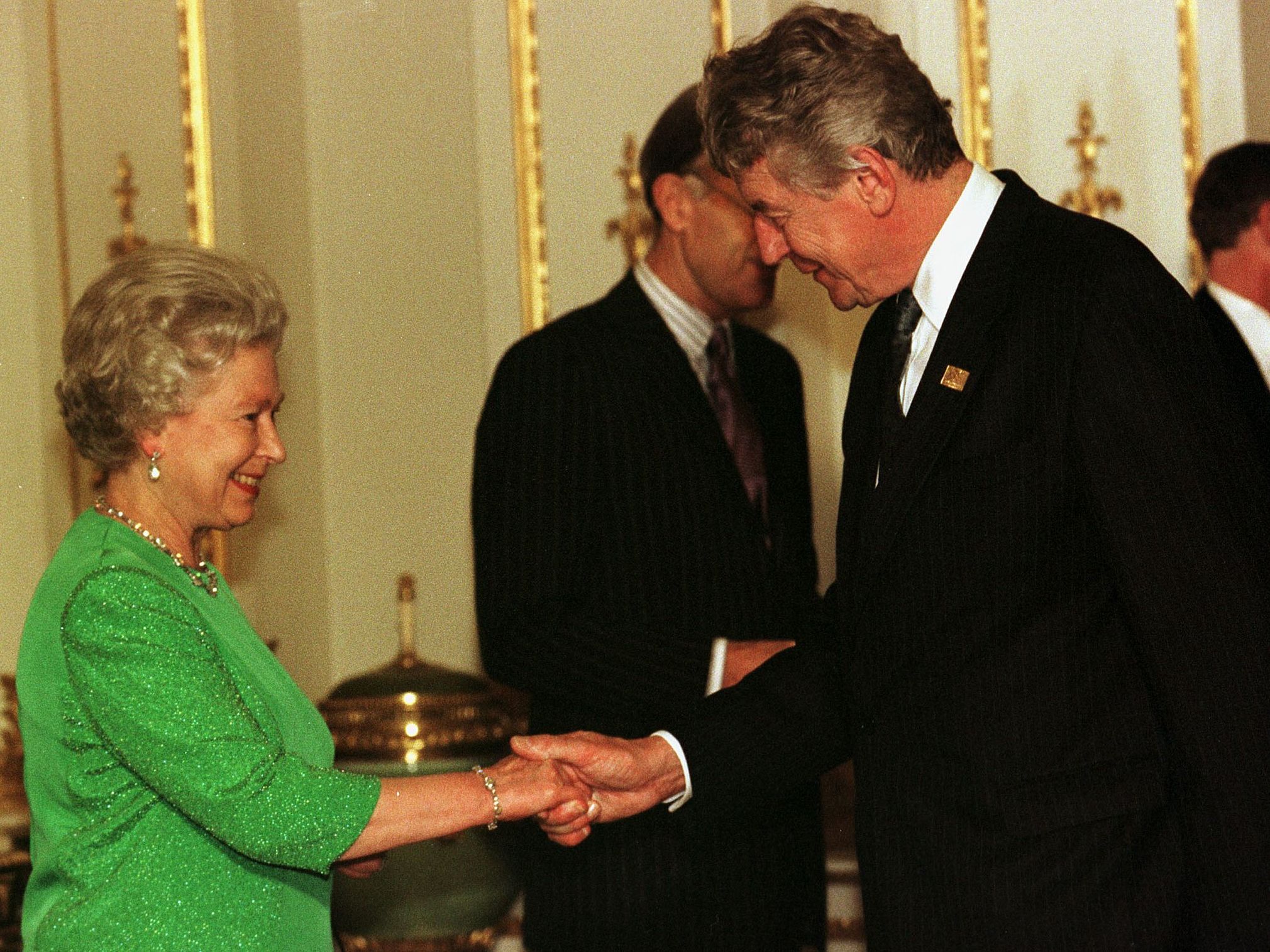 Meeting the Queen at Buckingham Palace in 1998 during the Asia-Europe meeting